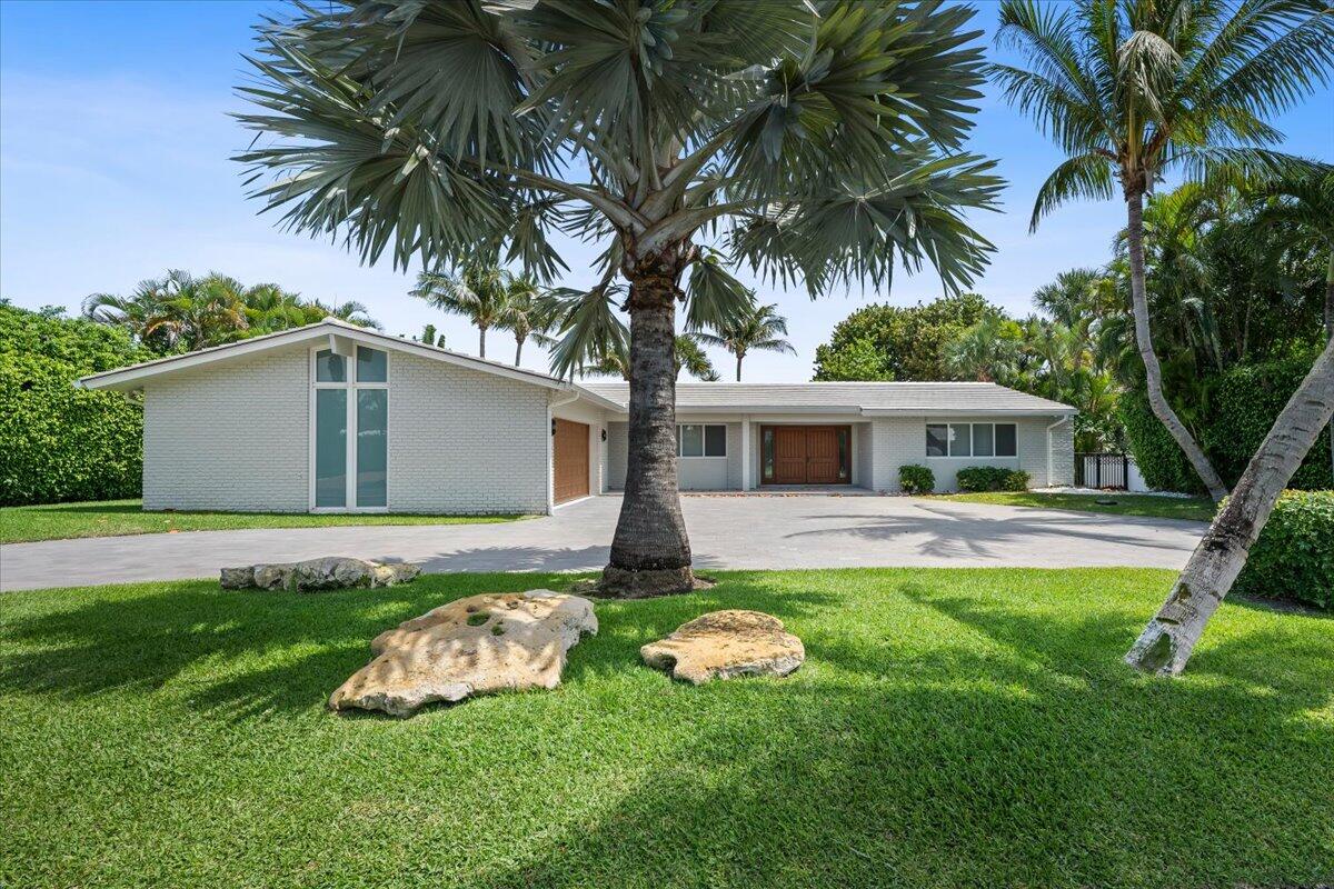 Ibis Isle  Rare Offering   Impeccably maintained and beautifully updated, this one-story contemporary 3-bedroom, 2-bath Intracoastal Waterway waterfront residence offers 100 feet of prime frontage, showcasing tranquil water views from the main living areas and primary suite.Nestled in the highly desirable Palm Beach community of Ibis Isle, this exceptional home is a true hidden gem. Thoughtfully curated upgrades include a fully renovated designer kitchen with premium appliances, elegantly updated spa-like bathrooms, impact glass throughout, including windows, doors, garage door, and front entry, a resurfaced pool, and finished pool deck, driveway, porch, and foyer flooring— creating a seamless blend of modern sophistication and effortless coastal living.... Ideally located just minutes from the beach, world-class golf, and premier tennis, this is a rare opportunity to own a meticulously updated Intracoastal Waterway home in Palm Beach. Perfect for entertaining or simply relaxing while enjoying the ultimate waterfront lifestyle. A must see.