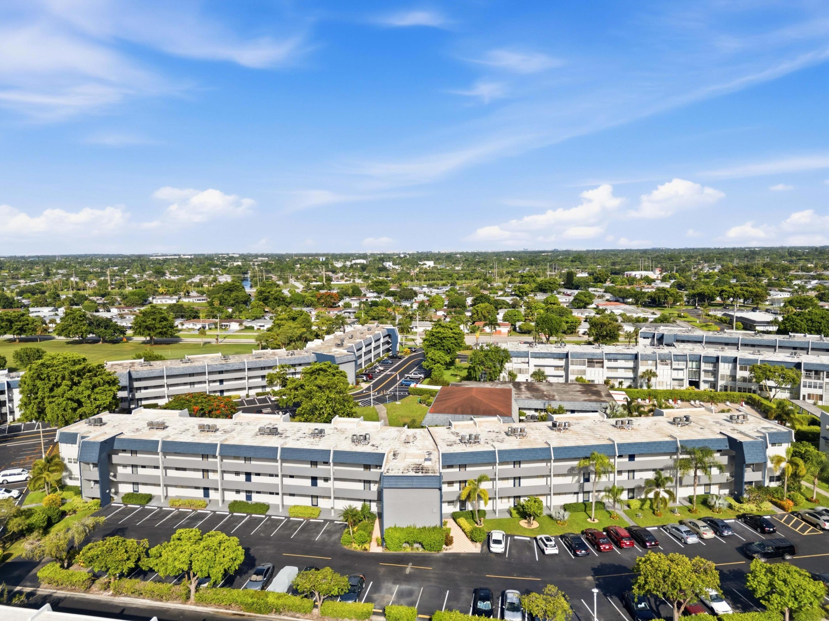 Enjoy the Florida lifestyle in this beautifully maintained 2-bedroom, 2-bathroom condo with a versatile den, offering 930 sq. ft. in a desirable 55+ golf course community. Located in a 3-story building with elevator access, this west-facing unit features a bright, functional layout perfect for year-round living or a seasonal retreat.  Residents enjoy assigned parking, ample guest parking, community laundry, a sparkling pool, and a vibrant clubhouse with a fitness center, library, game room, and year-round social activities. Beautifully landscaped grounds and resort-style amenities make every day feel like a getaway.  Furniture negotiable. Association approval requires a 700+ credit score and $40,000 minimum annual income.