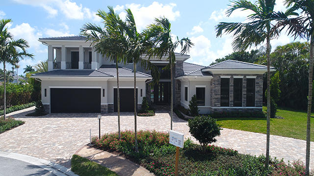 NEW CONSTRUCTION! Elegant and modern West Indies-inspired home with luxurious finishes. The spacious floor plan features 5 bedrooms and 7.1 baths. The master suite, located on the ground floor, offers his/her baths and generous closet space. All guest bedrooms are en-suite. This custom home is ideally sited on an oversized lot in a cul-de-sac and boasts a SE exposure for the resort-style pool, lanai, and beautiful golf course views. The 6,470 sq. ft. under air residence is move-in ready!