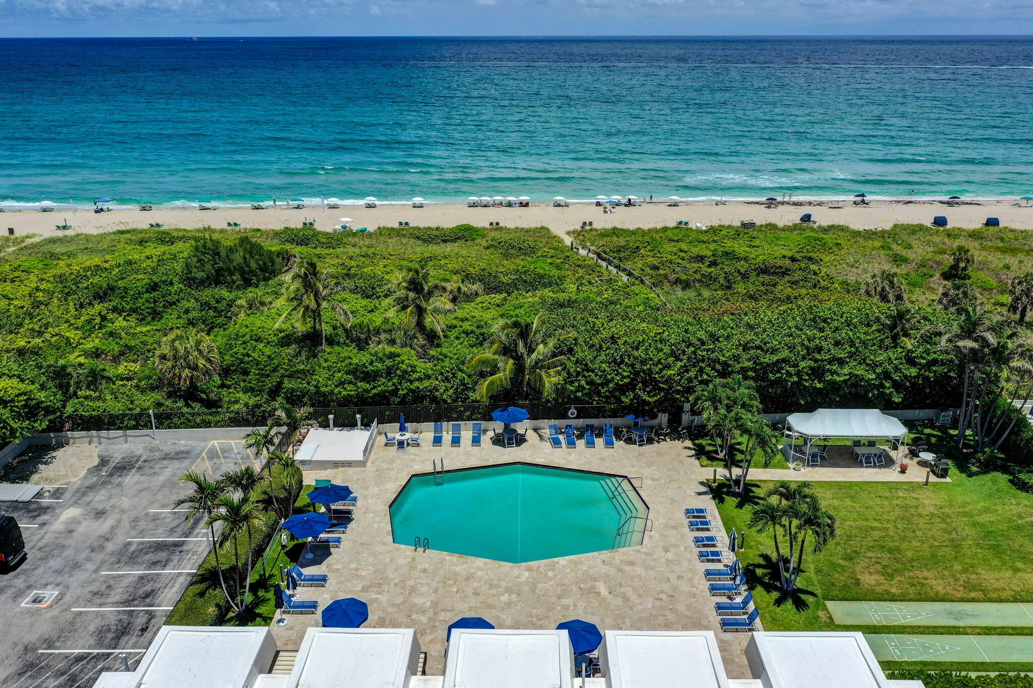 Built in 1971, the Atrium at Palm Beach Shores is located on Singer Island, Florida. This 140-unit (8 floor) condominium is situated right on the coast of the Atlantic Ocean. Enjoy a breath taking sunrise as you stroll our clean beaches or fish in our clear waters. Residents of the Atrium Condominium enjoy an exceptional array of amenities designed for comfort and convenience. Relax by the swimming pool, stay active in the fitness center, or gather with friends and neighbors in the clubhouse and game room. The beautifully maintained lobby creates a welcoming atmosphere, while elevators provide easy access throughout the building. A picnic area offers the perfect setting for outdoor enjoyment, all within a premier oceanfront community. MOTIVATED SELLER. Exceptional opportunity to create your dream coastal retreat at the Atrium Condominium. This oceanfront residence is ready for renovation to customize to your personal taste. However, it has a new AC unit, water heater and hurricane windows. Ideally located just minutes from the airport and within walking distance of numerous restaurants, shopping, and entertainment options, the location is truly unbeatable. Residents enjoy a variety of amenities, including a swimming pool ,clubhouse, fitness center, game room, picnic area, elevators and the convenience of beachfront living. Whether you're an investor or a buyer with vision, this property presents a rare chance to transform a well-located condominium into something truly special. MOTIVATED SELLER.