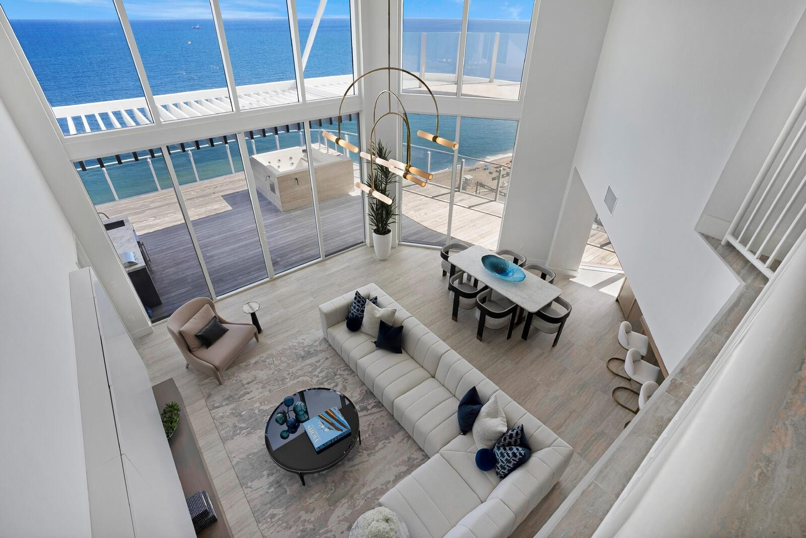 BRAND NEW, FOUR SEASONS UNIQUE 2 STORY DUPLEX RESIDENCE WITH PRIVATE ELEVATOR AND PRIVATEJACUZZI, Seventeen floor, with 4 bedrooms, loft and 4.5 bath southeast corner direct ocean views. Dramatic 20 feet floor to ceiling glass and gracious open individual terraces afford you ample natural light throughout the home.Gourmet kitchen with custom Italcraft lacquered cabinetry, Sub Zero and Wolf appliances, outdoor summer kitchen.Dramatic owners retreat configuration optimizes privacy between you and your guests as well as offering additionalbedrooms with ensuite baths and an additional half bath. Abundant closet space throughout this luxury residence.glass rails maximize your views of the ocean. Assigned parking, either self park or valet, amenity offered to all owners.