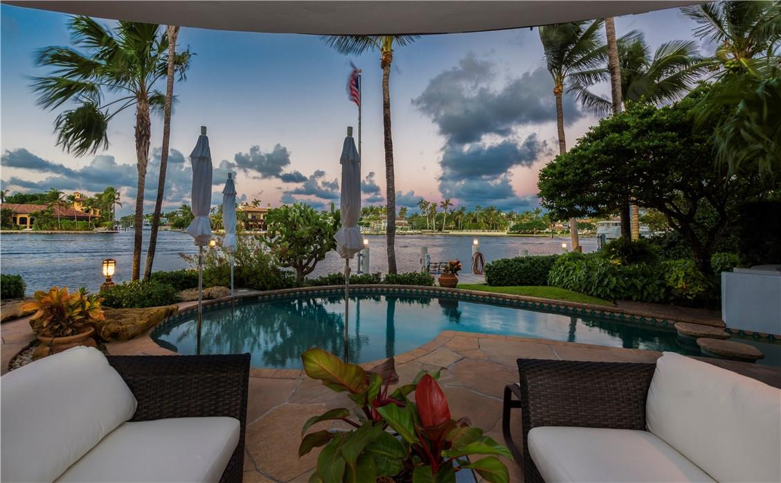 Spectacular widest New River views await from this Contemporary Rio Vista stunner!  Unique architectural details adorn this 5,000 SF+ custom built home by Miller Construction, intricately sited on an over-sized 14,000 sf lot and offering 100’ of direct river frontage. This rarely available piece of paradise captivates with stunning downtown skyline views and a constant parade of boats dancing on the water beyond.  Deep water dockage, Minutes to the ocean and situated on highly sought after SE 7th Street.