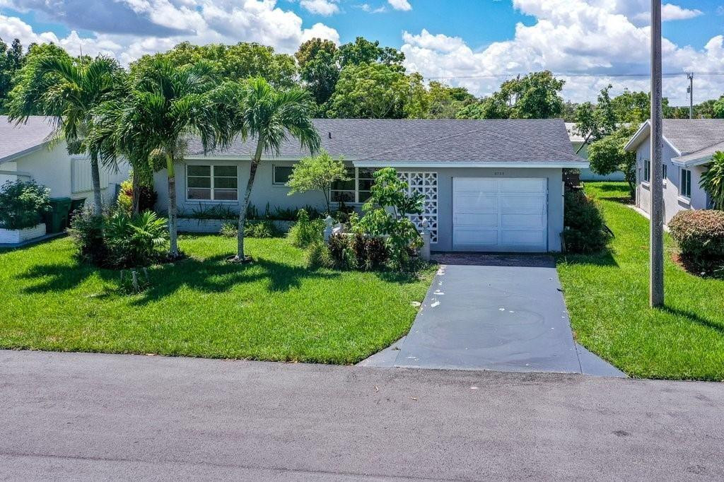 Well-maintained 2-bedroom, 2-bath single-family home located in a desirable 55+ Tamarac community. This home offers a spacious layout, bright living areas, and low-maintenance living. Enjoy community amenities and a peaceful neighborhood atmosphere while being conveniently located near shopping, dining, and healthcare facilities.