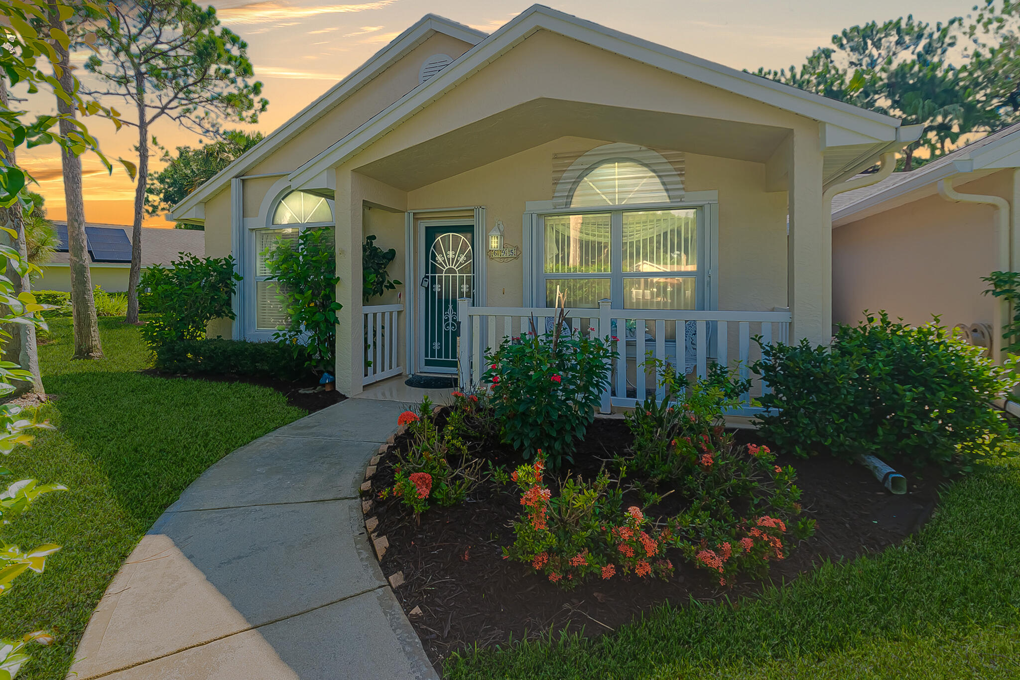 Welcome to this beautifully updated corner villa in the sought-after 55+ community of Kings Isle! This spacious 2BR/2BA villa offers separate living and family rooms, generous bedrooms, an oversized screened lanai, and a dedicated laundry room with washer & dryer. The 2023 kitchen features 42" two-tone soft-close cabinetry, granite countertops, stainless steel appliances, and a Lazy Susan. Updated bathroom vanities, a 2022 roof, 2021 A/C, accordion shutters, whole-house water softener, and abundant storage add to the appeal. HOA includes lawn care, water, trash, cable, internet, exterior painting, clubhouse, pool, fitness center, tennis, and a vibrant social lifestyle just minutes from St. Lucie West.
