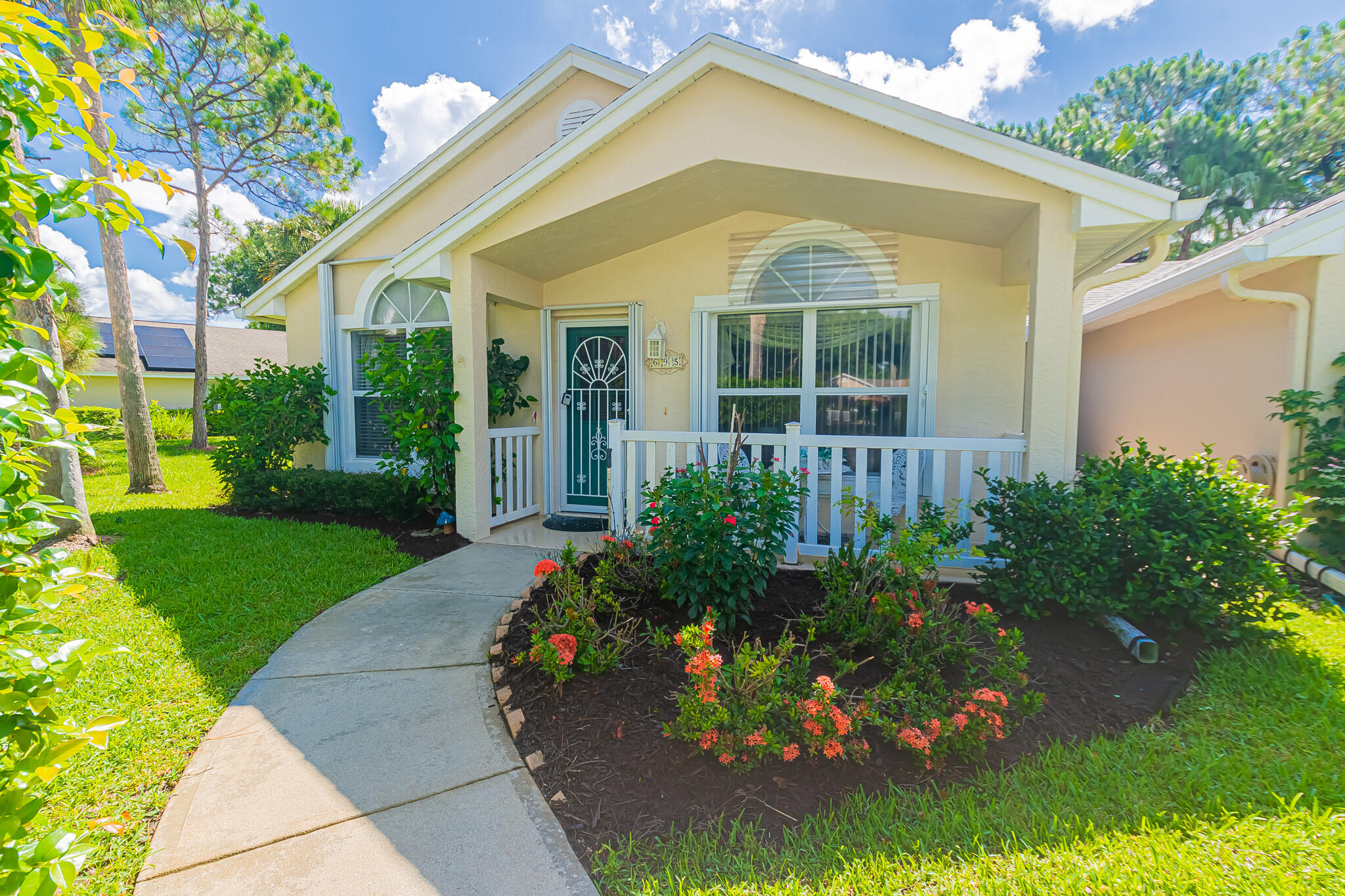 Welcome to this beautifully updated corner villa in the sought-after 55+ community of Kings Isle! This spacious 2BR/2BA villa offers separate living and family rooms, generous bedrooms, an oversized screened lanai, and a dedicated laundry room with washer & dryer. The 2023 kitchen features 42" two-tone soft-close cabinetry, granite countertops, stainless steel appliances, and a Lazy Susan. Updated bathroom vanities, a 2022 roof, 2021 A/C, accordion shutters, whole-house water softener, and abundant storage add to the appeal. HOA includes lawn care, water, trash, cable, internet, exterior painting, clubhouse, pool, fitness center, tennis, and a vibrant social lifestyle just minutes from St. Lucie West.