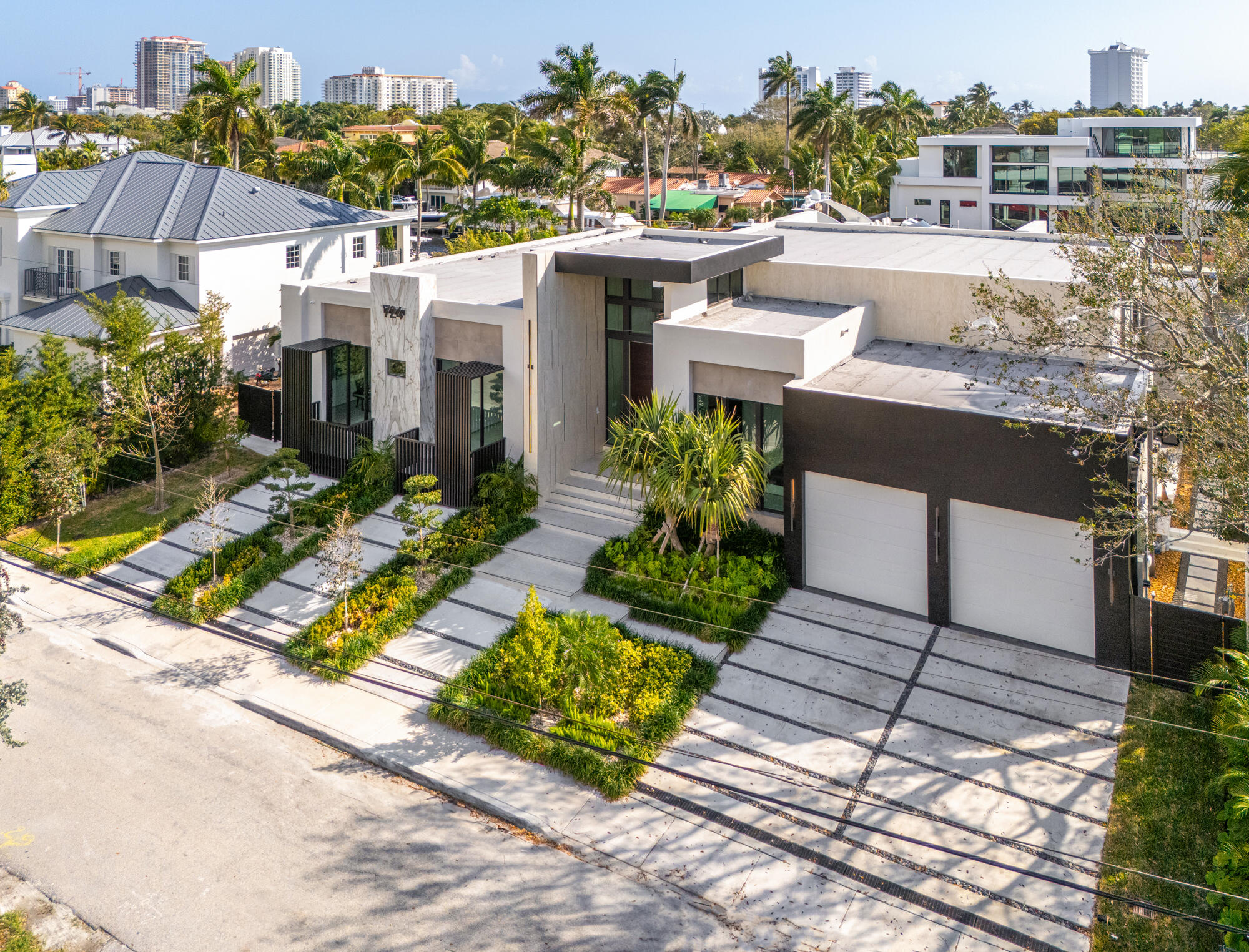 Experience unparalleled waterfront luxury living in the sought-after Riviera Isles community of Fort Lauderdale, just moments from the vibrant Las Olas Boulevard. This modern masterpiece boasts 100 feet of prime waterfront, offering deep water dockage and ocean access ideal for yacht owners. Newly constructed, the home epitomizes sophistication with its minimalist design and cutting-edge smart home technology.

Step inside to discover a world of elegance, where designer finishes and panoramic water views create an atmosphere of opulence. Entertain effortlessly in the gourmet kitchen and spacious living areas, or retreat to the privacy of the tranquil master suite. The outdoor oasis features a sparkling pool overlooking the serene waters, perfect for enjoying the Florida sunshine and alfresco gatherings. With five bedrooms, five full baths, and one half bath spread across 4,451 square feet, there's ample space for luxurious living. Nestled in one of Fort Lauderdale's most coveted neighborhoods, this residence offers easy access to downtown amenities and the pristine beaches, making it the ultimate waterfront retreat. Don't miss this opportunity to own a slice of paradise in one of Fort Lauderdale's most coveted neighborhoods.