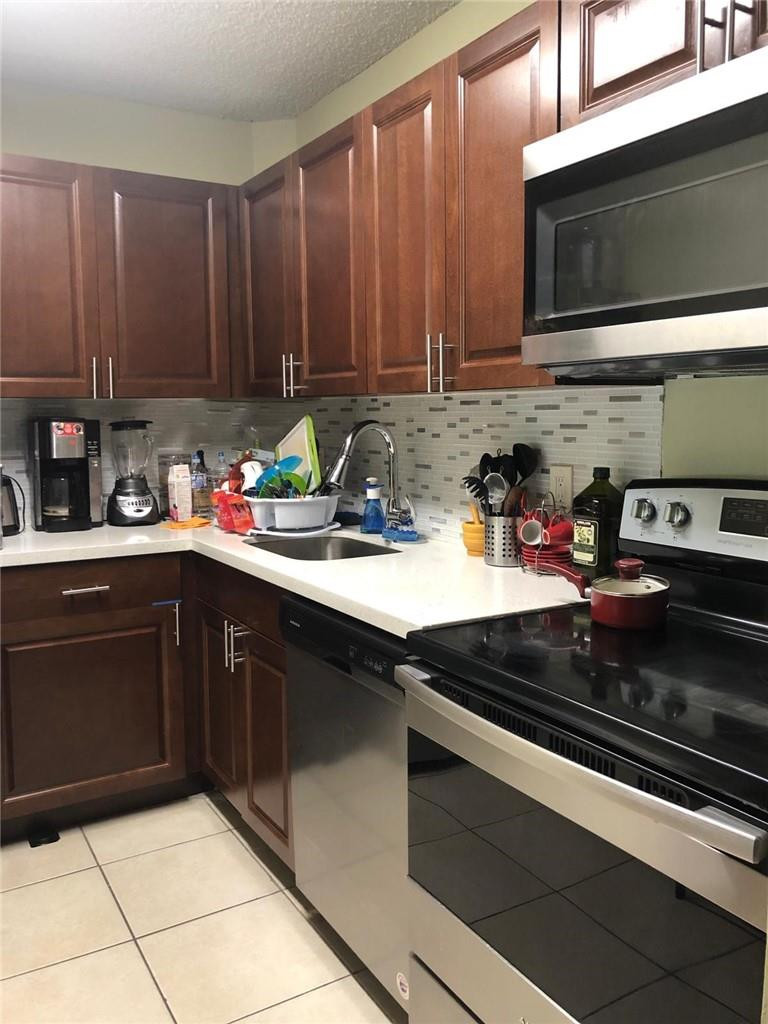LAKES OF JACARANDA CONDO - Residential Lease