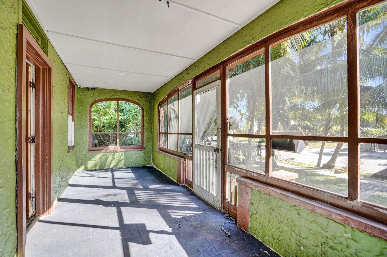 Charming Spanish Mission-style multi‑family triplex positioned near the beaches and Intracoastal Waterway, and just minutes from Downtown Northwood with its vibrant shops and restaurants. Downtown West Palm Beach is approximately a 15‑minute drive, with additional shopping and dining nearby, including Tanger Outlets. This well‑located property is ideal for  investors seeking stable rental income or for a residential buyer looking to offset living expenses through income‑producing units. The layout offers exceptional flexibility—live in the spacious main house while renting the two additional units, or lease all units for maximum return. There is no HOA, enhancing long‑term investment value. The main residence features 3 bedrooms and 1 bath, while the separate rear building includes a 1 bedroom, 1 bath unit and a studio. Separate electric meters add convenience and efficiency for both owners and tenants. With strong rental demand and a desirable coastal location, this property presents an outstanding opportunity for both portfolio growth and lifestyle plus income living.
