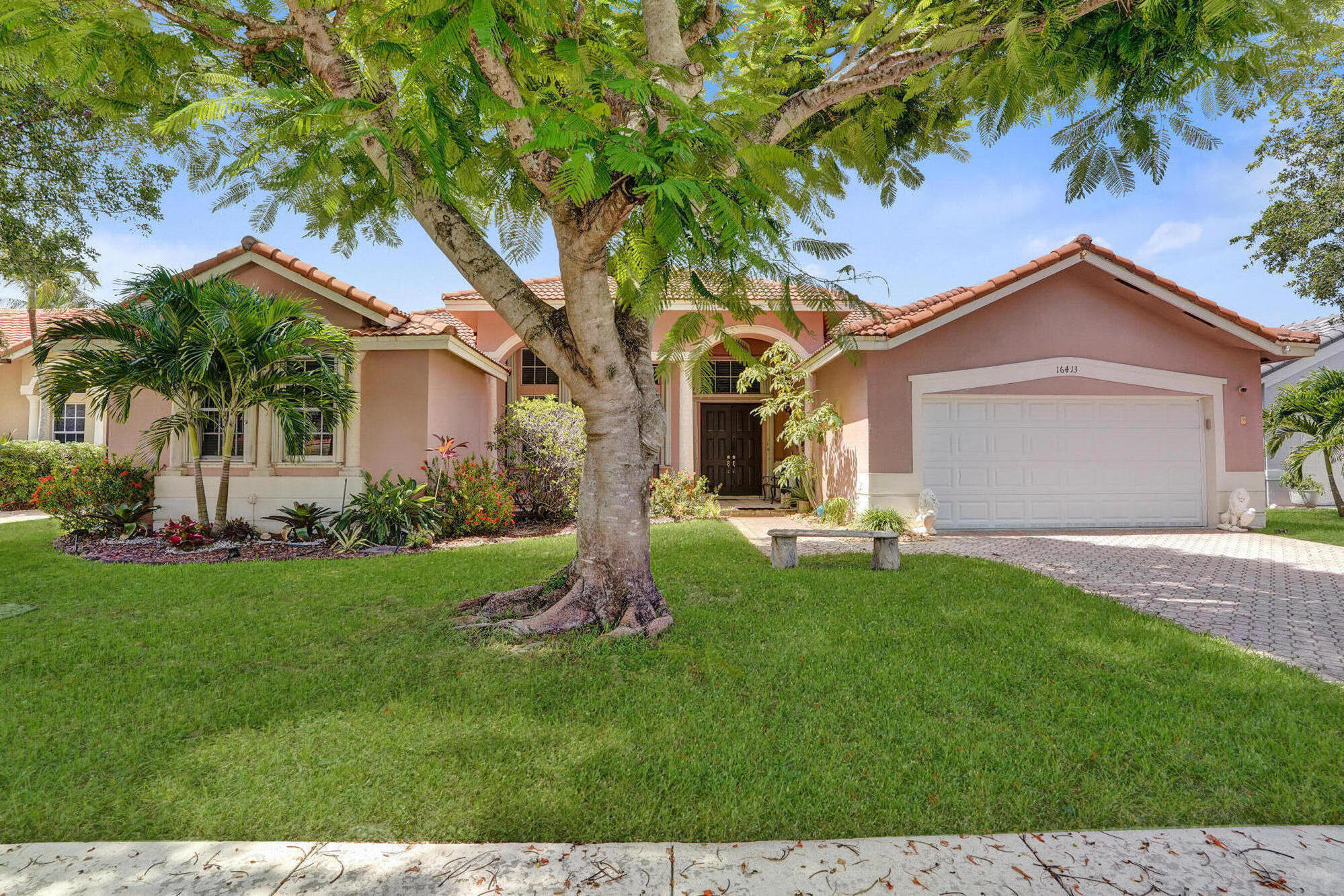 Nestled on a tranquil canal in the gated community of Spring Valley Estates, this spacious split-bedroom floor plan welcomes you with soaring ceilings & serene water views the moment you step inside. The generous primary suite features a walk-in closet, dual vanities, a relaxing spa tub & a separate shower. Tile flooring flows throughout most of the home, with warm wood flooring in the bedrooms. Step outside to a covered patio overlooking a large backyard with plenty of space to add a pool, outdoor kitchen, or create the private outdoor retreat you've always envisioned. Ideally located near top-rated schools, parks, shopping, dining, and major highways, this home offers the perfect blend of comfort, convenience, and endless potential.