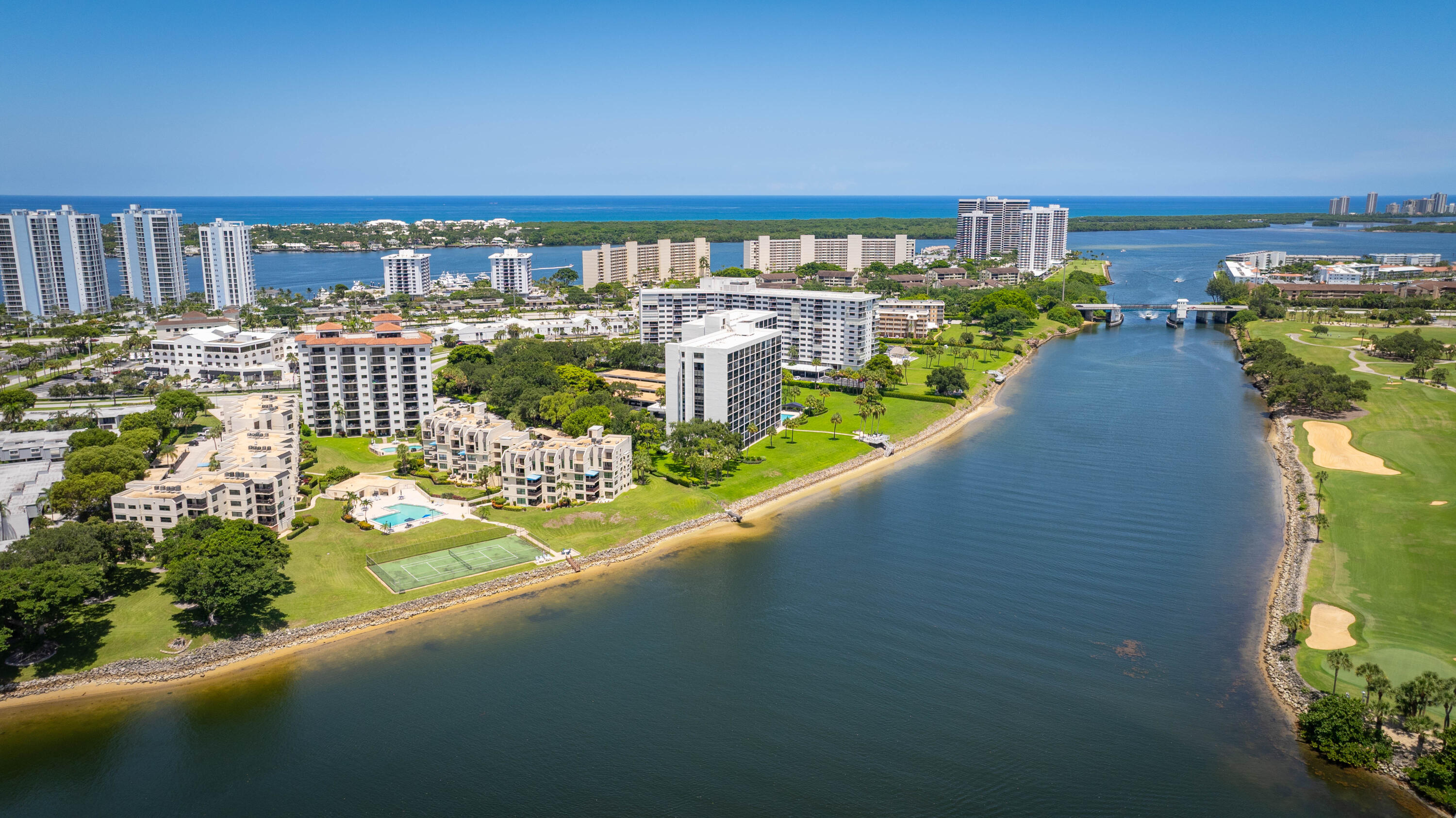 Exceptional waterfront corner residence in the heart of North Palm Beach offering expansive Intracoastal and golf course views from a private balcony. Nearly 2,000 sq ft with a generous living and dining area, open kitchen with granite countertops and stainless steel appliances, spacious bedrooms, hurricane impact windows, in-unit laundry, and abundant storage. Offered fully furnished — completely turnkey. Resort-style amenities include a waterfront pool, tennis courts, waterfront deck, secured elevator access, and covered parking. Building has passed all state-mandated inspections including the 40-year milestone inspection. New roof completed December 2024. All assessments paid in full. HOA includes cable TV, water, trash, elevator, building insurance, common area maintenance, and grounds