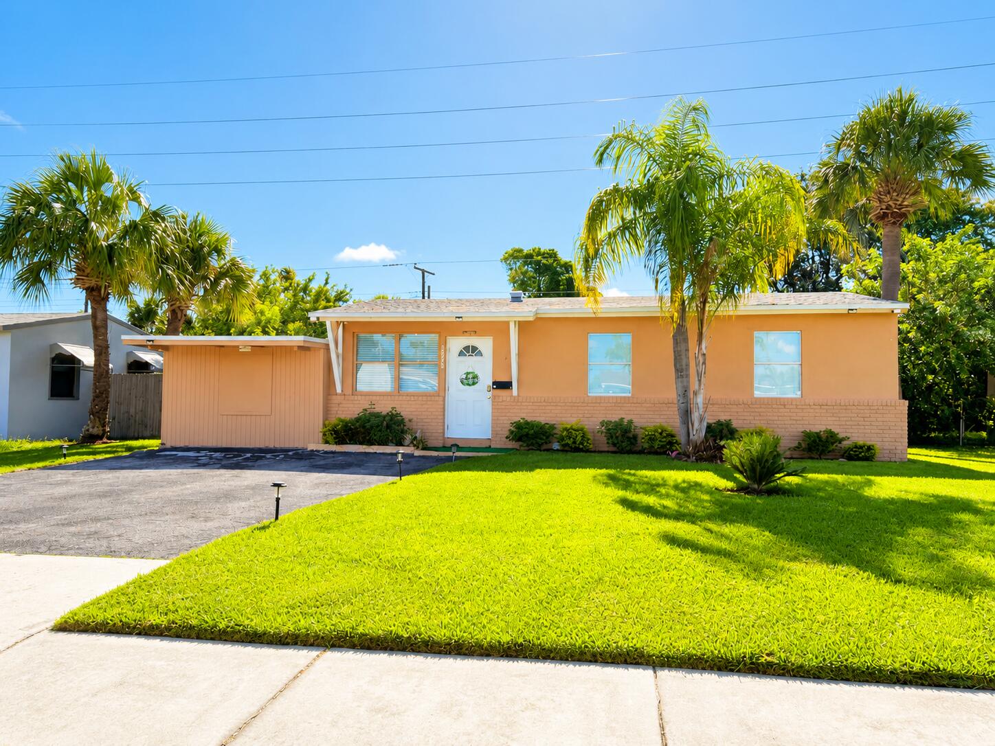 Exceptional opportunity to own a beautifully updated pool home just minutes from the water and sought-after Singer Island! Featuring a new roof (2024), newer A/C (2023), and no HOA, this property is ideal as a primary residence, vacation home, or investment opportunity. Currently operating as an active Airbnb, the home offers flexibility in a prime coastal location. Enjoy a renovated pool, fresh paint, and a spacious outdoor patio perfect for entertaining and relaxing. Conveniently located near beaches, boating, marinas, waterfront dining, shopping, and entertainment. Property sold as-is. Call or message listing agent for showings, as property may be occupied by guests. Buyer and buyer's agent to verify all measurements, permits, zoning, and property details.