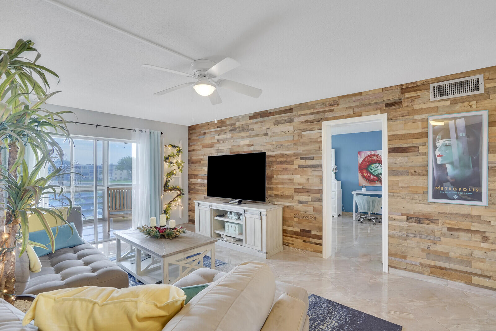 Absolutely beautiful condo with wood feature wall, all ceramic tile thru out, up graded kitchen and bathrooms.  Huge patio with view of the lake.  This is a must see for all your clients.