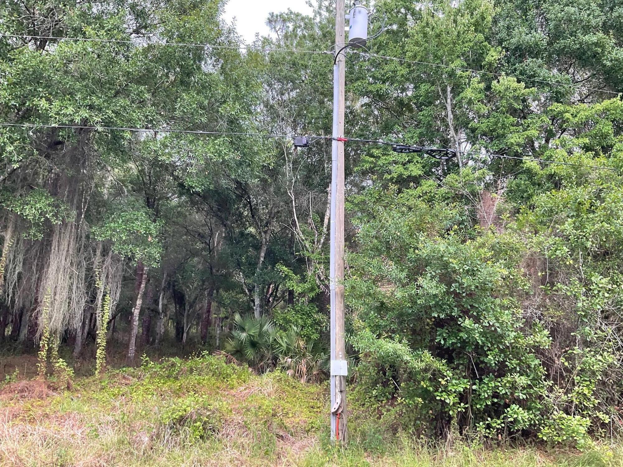 Country Hill Estates- Tired of the city traffic, looking for privacy, Build the home of your dreams on this Beautiful 2.37-acre parcel with room for all the toys!  Close to Lake Okeechobee, and Just Minutes to town. pole on property. Go Direct, sign on Property.