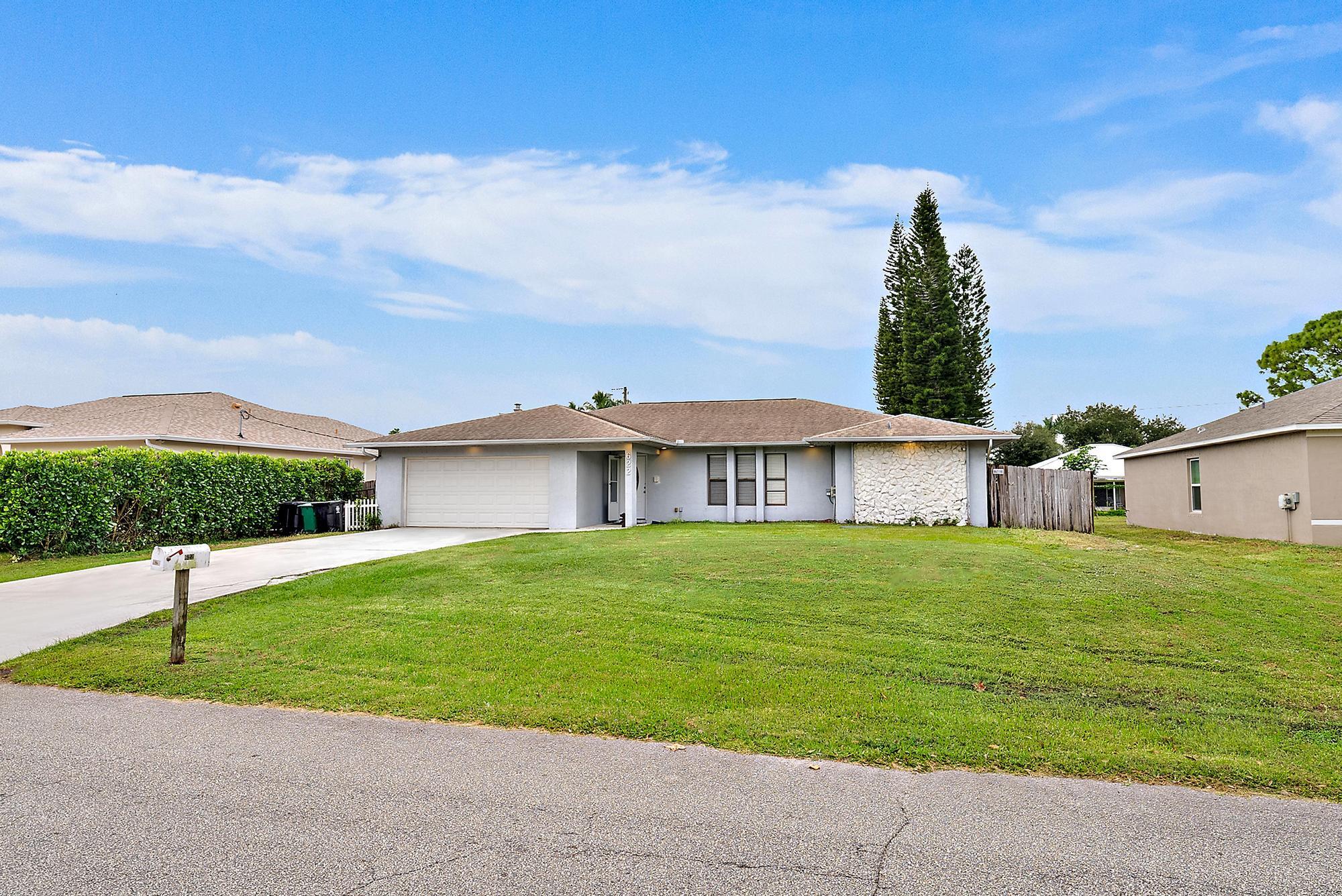 Explore the potential of this well-appointed home at 622 Southwest Hogan Street in Port St. Lucie, FL. With 3 bedrooms and 2 bathrooms, this 1,944 square foot residence offers spacious living on a 10,000 square foot lot. The split floor plan and  private outdoor space set the stage for relaxation, while the backyard provides additional leisure opportunities.  This home is Pet friendly and part of a Federal Bankruptcy Court Sale, this property presents a unique opportunity for savvy buyers. Don't miss out on securing this remarkable real estate offering. For more information, please reach out.