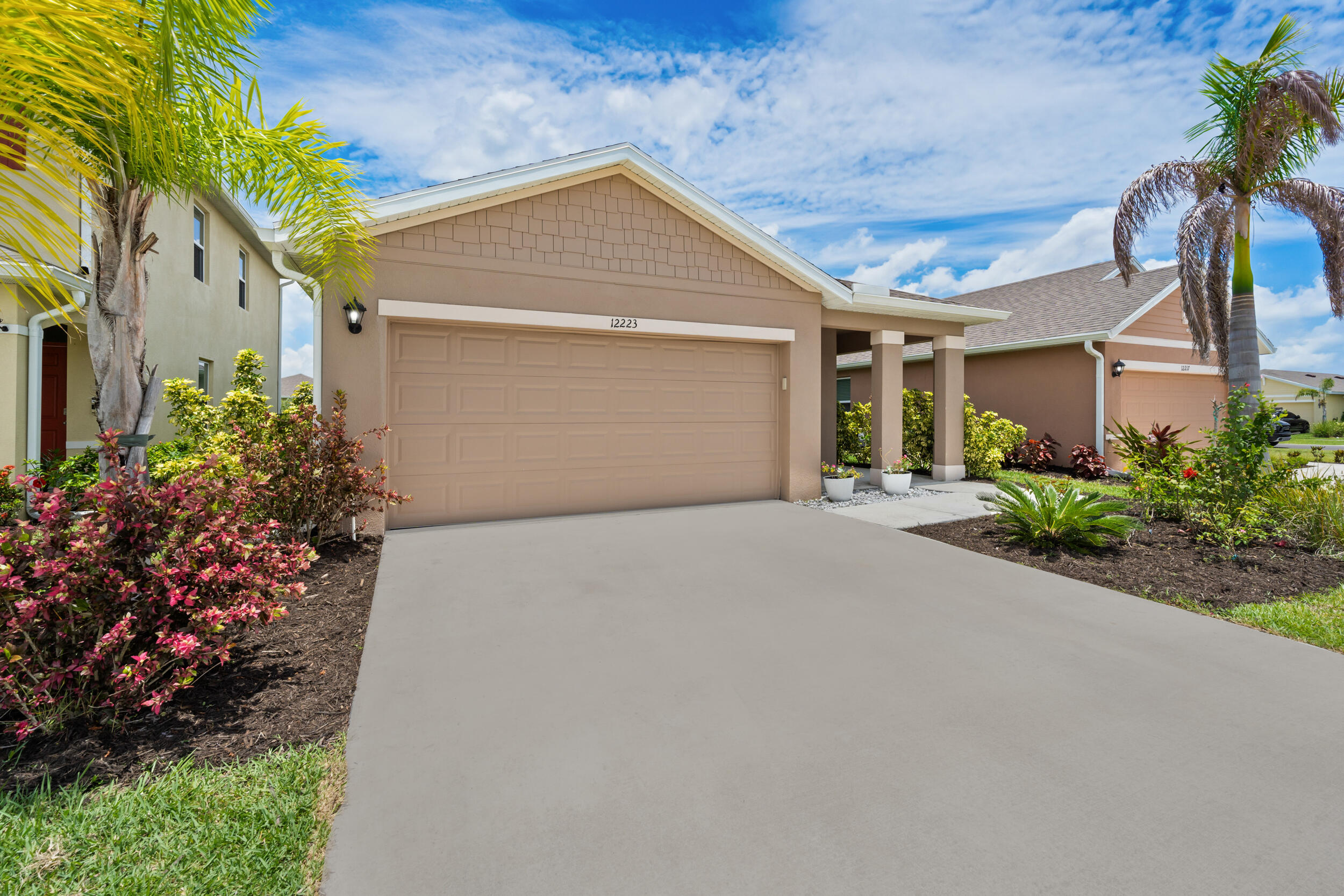 Welcome to this upgraded 3-bedroom, 2-bathroom single-family residence in Port St. Lucie's desirable Central Park community. This thoughtfully designed home offers 1,614 square feet of comfortable living space across one convenient floor plan, perfect for those seeking practical and efficient living. Upgraded quartz waterfall countertops, freshly painted, new fixtures and finishes. The open layout maximizes usable space while the three bedrooms and two full bathrooms ensure plenty of room for daily living and entertaining. This well-proportioned home delivers modern living in an established community. Located off Crosstown Parkway for easy commuting access and just Nextdoor to all that Tradition has to offer. Did I mention FULLY FENCED YARD and Resort style Amenities?