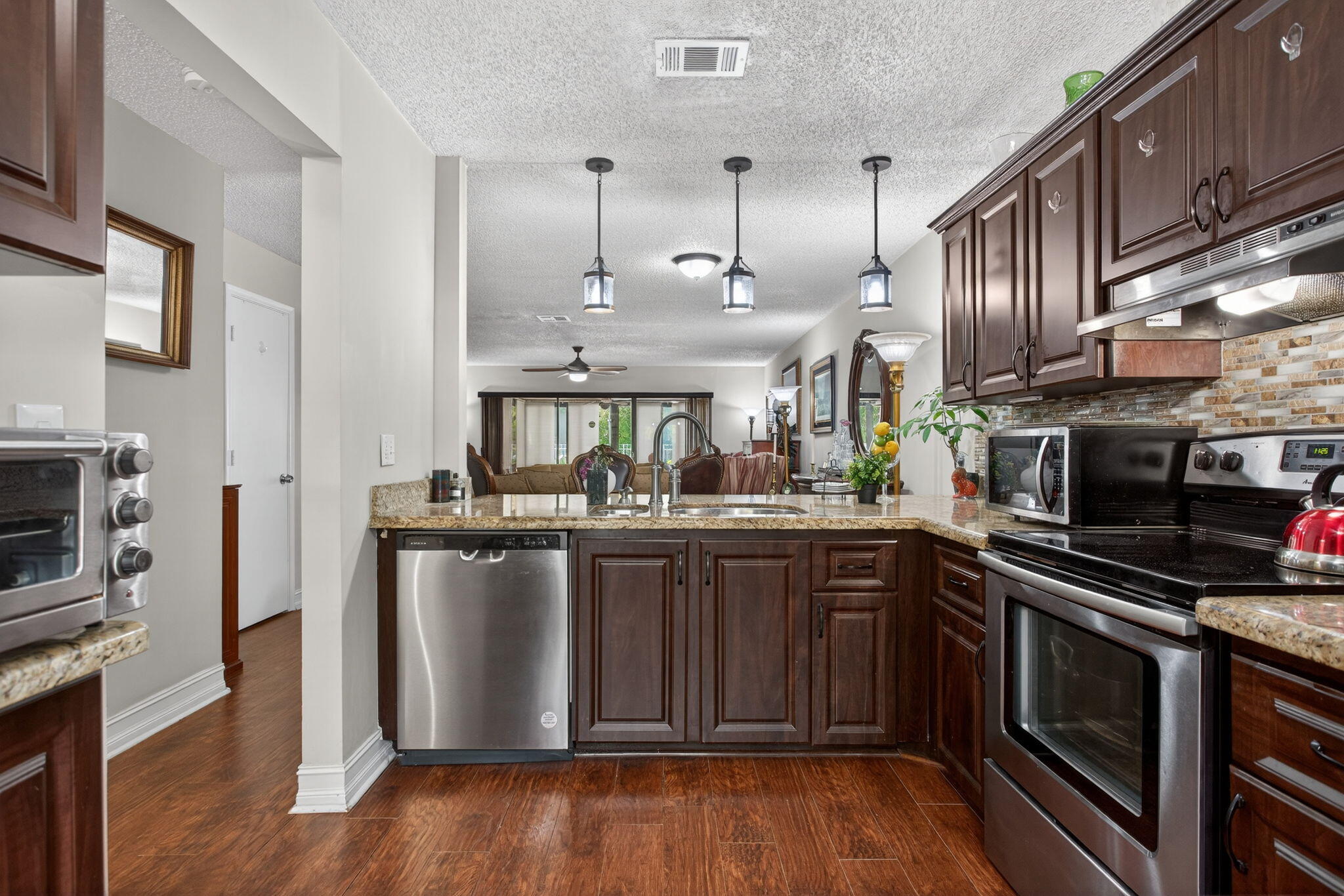 This rarely available & lovingly maintained townhouse is located in the desirable town of Lighthouse Point. 2BR/2.5BA w/ spacious layout wide open kitchen view to living/dining area. 1st floor half bath & convenient in-unit laundry.  From the large living area step outside to your private, enclosed patio overlooking the community pool. With its peaceful view & close proximity, it truly feels like your own backyard oasis.  Upstairs 2 generously sized bedrooms w/ ensuite baths..Enjoy the quiet charm of Lighthouse Pt  east of US-1, near shops, dining & beaches while maintaining a quiet residential feel.  Needs some updating.  Owner Motivated! INVESTORS CAN ALSO RENT RIGHT AWAY!!