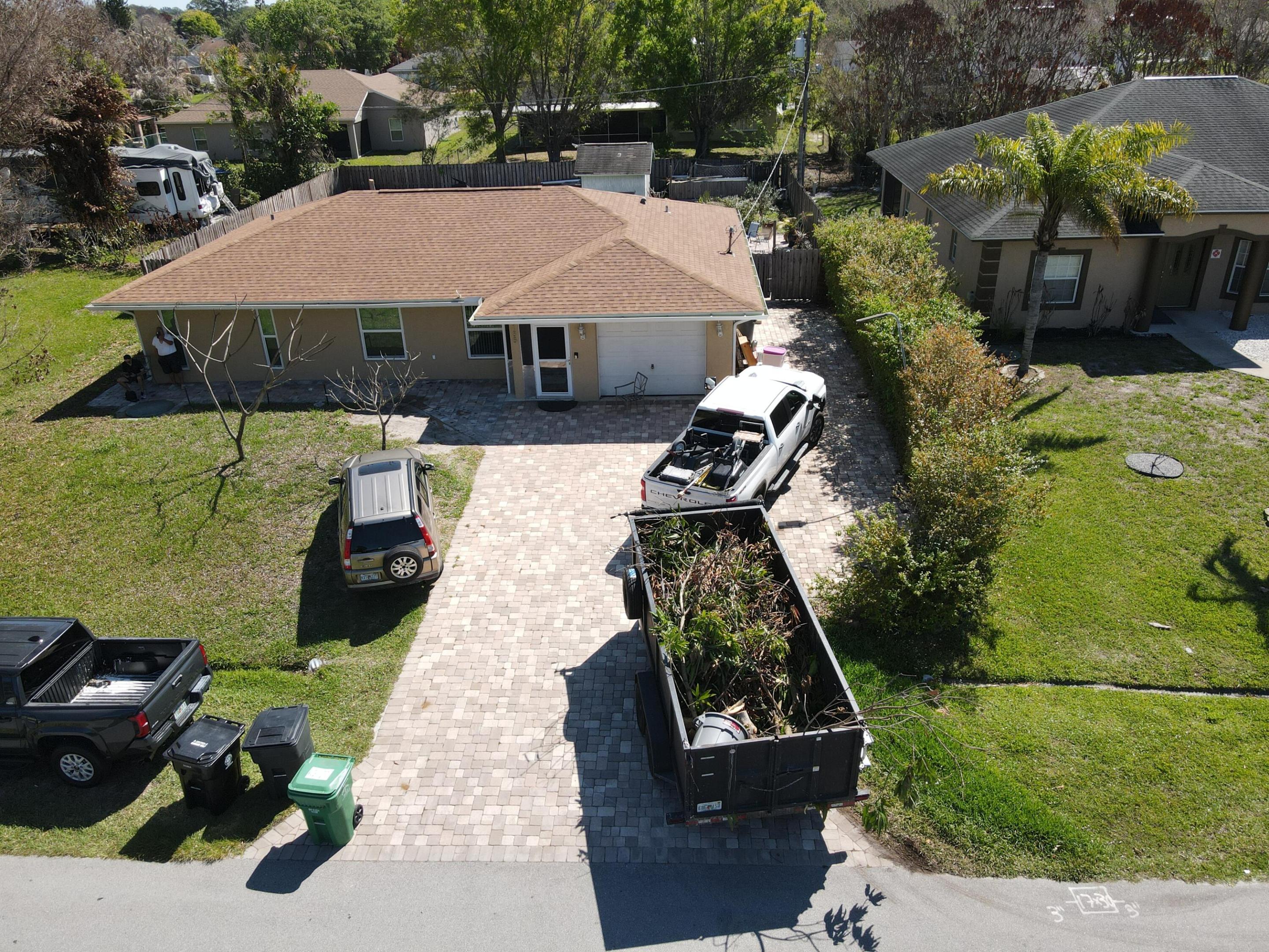 Your Private Oasis Awaits in Bayshore Heights! Move right into this beautifully maintained 4BR/2BA pool home where peace of mind meets Florida living. Major updates include a 2022 ROOF, 2021 AC, and IMPACT WINDOWS on most of the home to provide massive insurance savings.  The interior shines with granite countertops, stainless steel appliances, and easy-care tile throughout the main living areas. The smart split floor plan features a secluded 4th bedroom that is perfect for a private home office or guest wing. Step through the enclosed Florida sunroom to your backyard retreat featuring a stunning free-form pool and plenty of room for entertaining. Situated in a quiet, NO-HOA neighborhood just minutes from the Turnpike and shopping. This move-in-ready gem won't last!