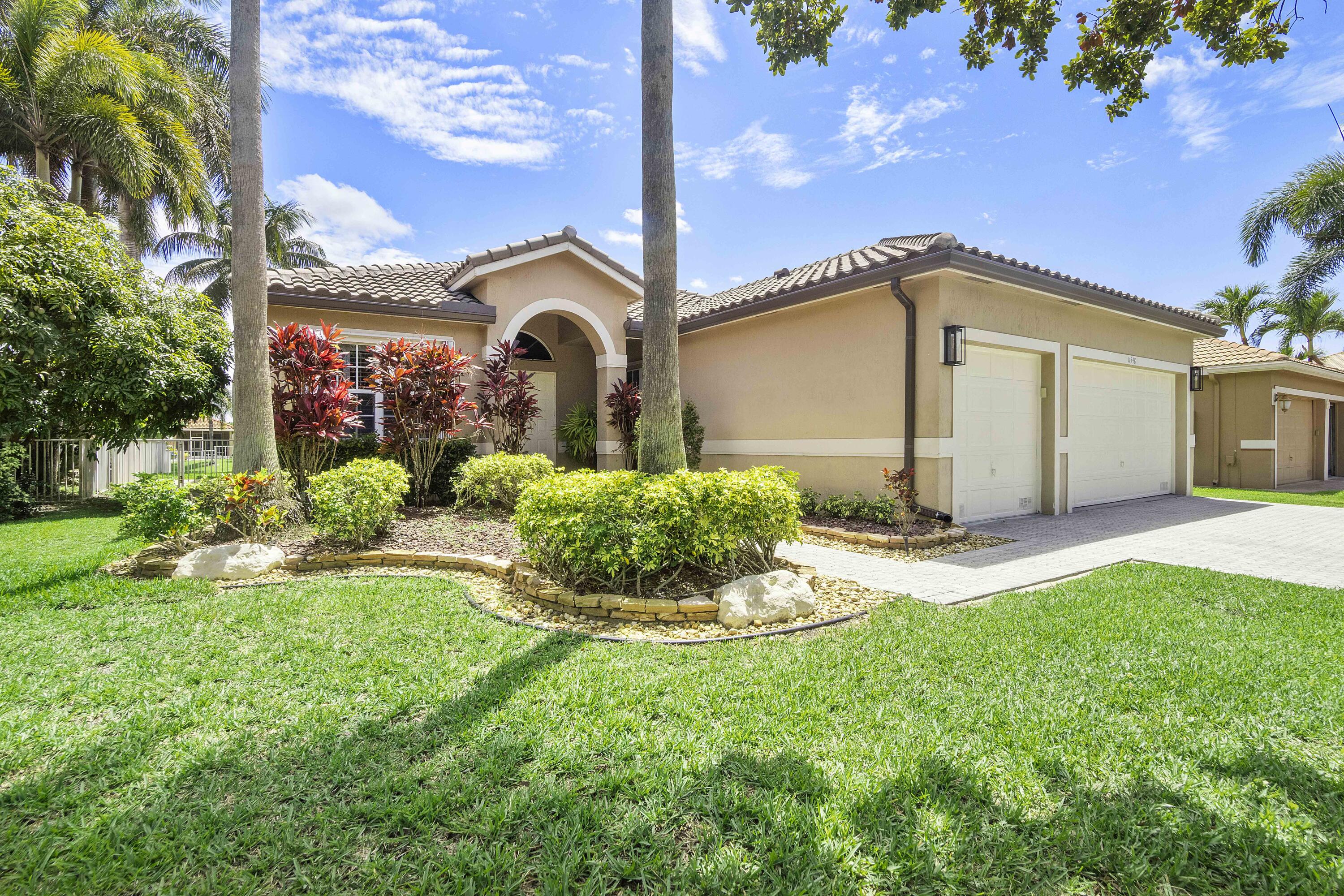 Experience luxury living in this exceptional 4-bedroom, 2-bath pool home with a PRIVATE OFFICE nestled within a highly sought-after gated community. Perfectly positioned on a  breathtaking waterfront lot, surrounded by palm trees, creating a secluded resort-style setting.  Featuring a spacious 3-car garage and over $100,000 in  upgrades completed in the last 5 years. Roof is 2024. The backyard feels like a private retreat. Top-rated schools, convenient access to shopping, dining, parks and major highways. Rare opportunity to own a beautifully upgraded waterfront home in one of the area's most desirable gated neighborhoods.