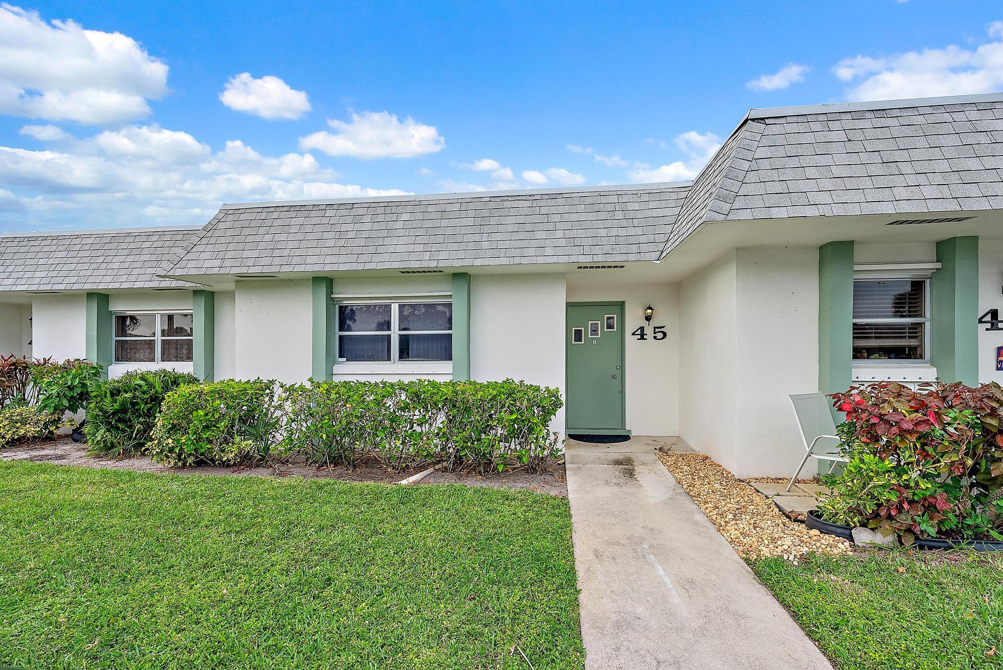 MOTIVATED SELLER! Welcome to your ideal home. This beautifully maintained, single-owner unit offers a spacious living and dining area plus an air-conditioned Florida Room, perfect for a home office, guest space, or relaxing retreat. Interior features include fresh paint, tile flooring throughout, a new A/C (2022), walk-in bedroom closet, and additional hallway storage. Enjoy a full-size laundry room with shelving and rear access to a private outdoor area. The HOA covers water, cable, roof maintenance, exterior insurance, and lawn care, along with amenities such as a heated pool, sauna, clubhouse, pickleball, tennis courts, and dog park. Two reserved parking spaces included. Ideally located near shopping, beaches, golf, and the airport. The property perfect for full-time or seasonal living