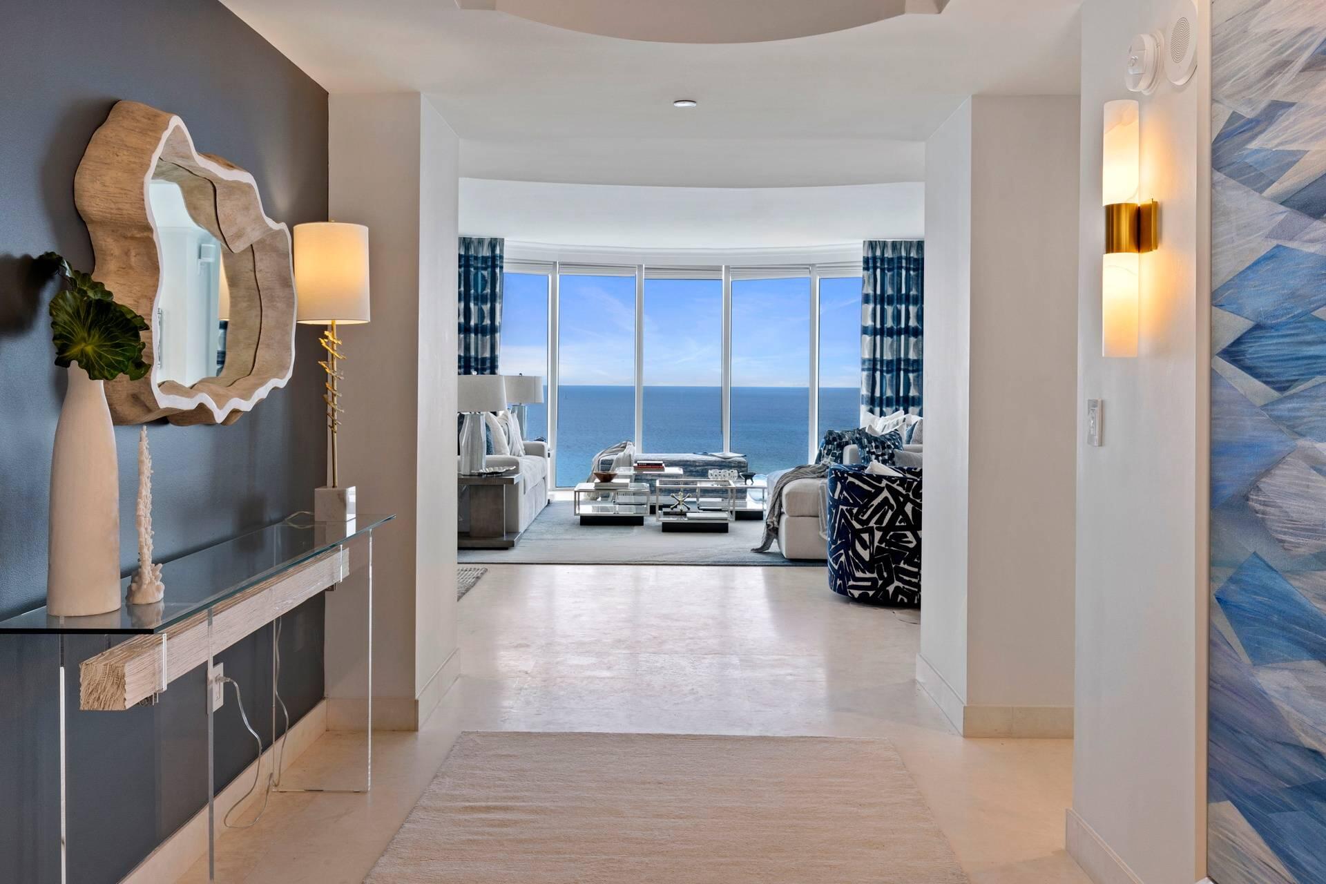 Spectacular 14th floor 3 bedroom corner Savona model with ocean views from every room.  Newly renovated and redesigned by Clive Daniels Homes with inspiration taken from the beauty of the Florida shoreline.

From the moment you step through the door, you are transported to a modern beach getaway.  The great room facing the ocean has white sandstone marble floors which run throughout the unit. 
There's also a cozy entertainment corner with new electric fireplace and TV monitor.  New draperies have been installed in the kitchen, great room and primary bedroom.  Other recent upgrades include:  new vanities and fixtures in all baths; LED high-hats, sconces and ceiling light fixtures;  Sonos sound system throughout unit; Lutron system to control lighting through a mobile app; and more...