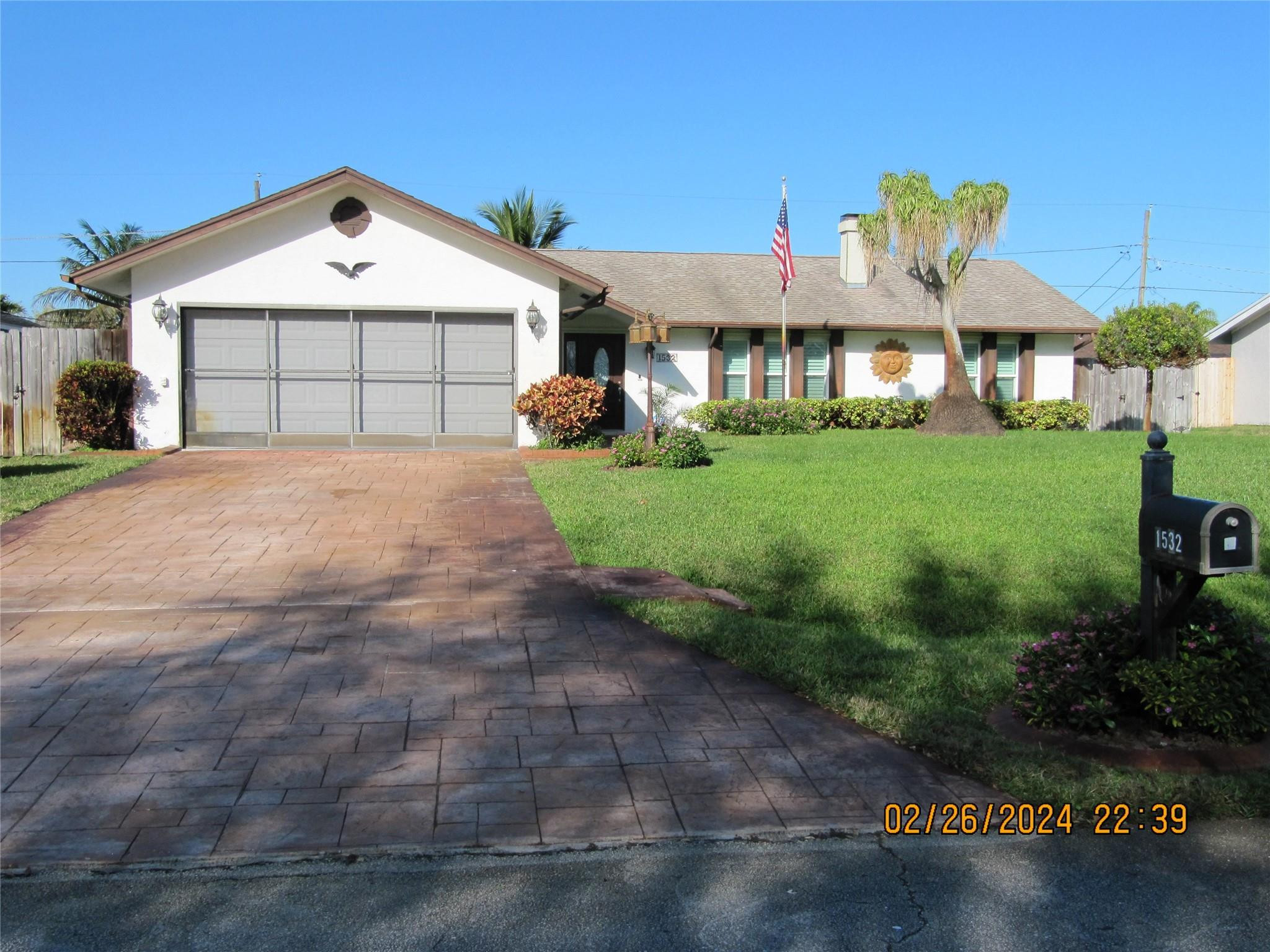 Home has just gotten a brand-new roof, new sprinkler pump, new GFCI outlets in the kitchen and bathrooms and has 1 year old hot water heater. The property is a split bedroom plan with the master occupying one side of the house and the other 2 bedrooms and bath on the other. Enter the home into a formal foyer with coat and storage closet and enter the living room, through one of 3 architectural arches, with full working fireplace. The dining area beckons you to see the kitchen complete with LG French door refrigerator with ice/water in the door and bottom freezer, LG convection self-cleaning oven, topped with the LG microwave. The dish washer completes the kitchen appliance package. The countertop and eat around counter snack bar are all granite (continue supplemental remarks) The double sinks bring your eyes through the pass-through window to the huge (11x30 foot) screened tiled patio attached to the rear of the house. The porch is completely screened and protected with metal pull downs protecting you from inclement weather and also has accordion hurricane shutters on the exterior for hurricane protection. The porch is accessed from the dining area or the family room through sets of sliding glass doors. The fenced back yard has 2 sheds for workshop and storage for the handy man or woman of the family. For your safety and comfort the home is equipped with an alarm system and a garage camera that lets you know who is coming up your stamped concrete 720 square foot driveway. The front of the 2-car garage is equipped with its own screening system which allows you to work or sit in comfort from being eaten by any flying creatures or to just enjoy a wonderful breeze as it blows through the house All of the windows are hurricane impact glass, and the garage door has hurricane bracing. The property also features 7 ceiling fans, an air-conditioned utility room with LG front loader washer and dryer on pedestals, and storage cabinets and a storage closet. The home is equipped with a central air conditioning system. The property is complete with a well water automatic sprinkler system and is currently still on a septic system, but the sewer lines are accessible for future hook up. The lot is approximately 10,000 square feet or .23 acres.