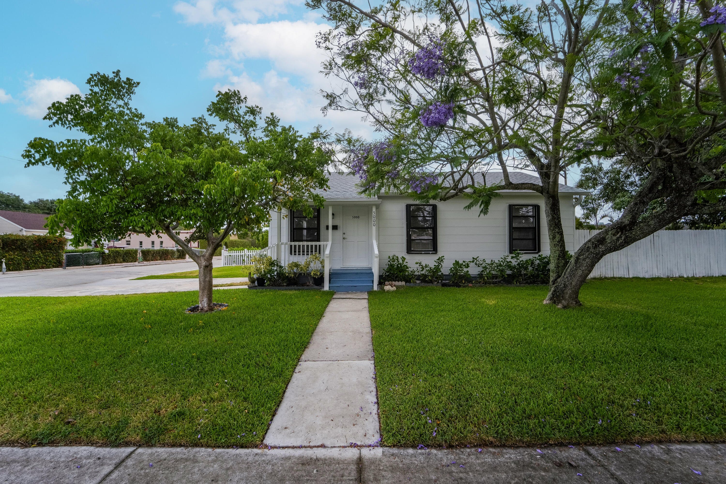 Completely updated and move-in ready! This charming 3-bedroom, 1-bath home features a brand-new 2025 roof and 2025 water heater, providing peace of mind for years to come. The beautifully renovated kitchen showcases modern finishes, new appliances, and updated bathroom offers a fresh, contemporary design. Warm wood flooring flows throughout the home, creating a seamless and inviting living space. Situated on a spacious corner lot with plenty of parking, this property is ideal for homeowners and investors alike. Conveniently located near shopping, dining, downtown West Palm Beach, beaches, and major highways. Don't miss this opportunity to own a turnkey home in a rapidly growing area!