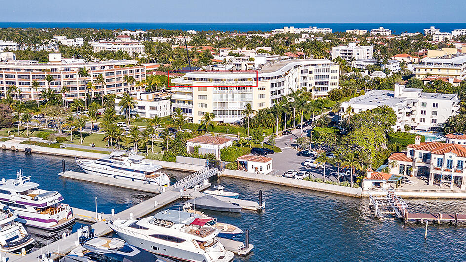 Fantastic direct waterfront penthouse one block from Worth Ave overlooking the new Peruvian town docks. There is over 1,300 sq. ft. of wrap around terrace that creates an amazing outdoor living space. This apartment has a split floor plan with an open kitchen looking into the family room. Included, is a separate 1 bedroom staff apt with bath on the ground floor. There is one covered parking space and 1 additional outdoor space.