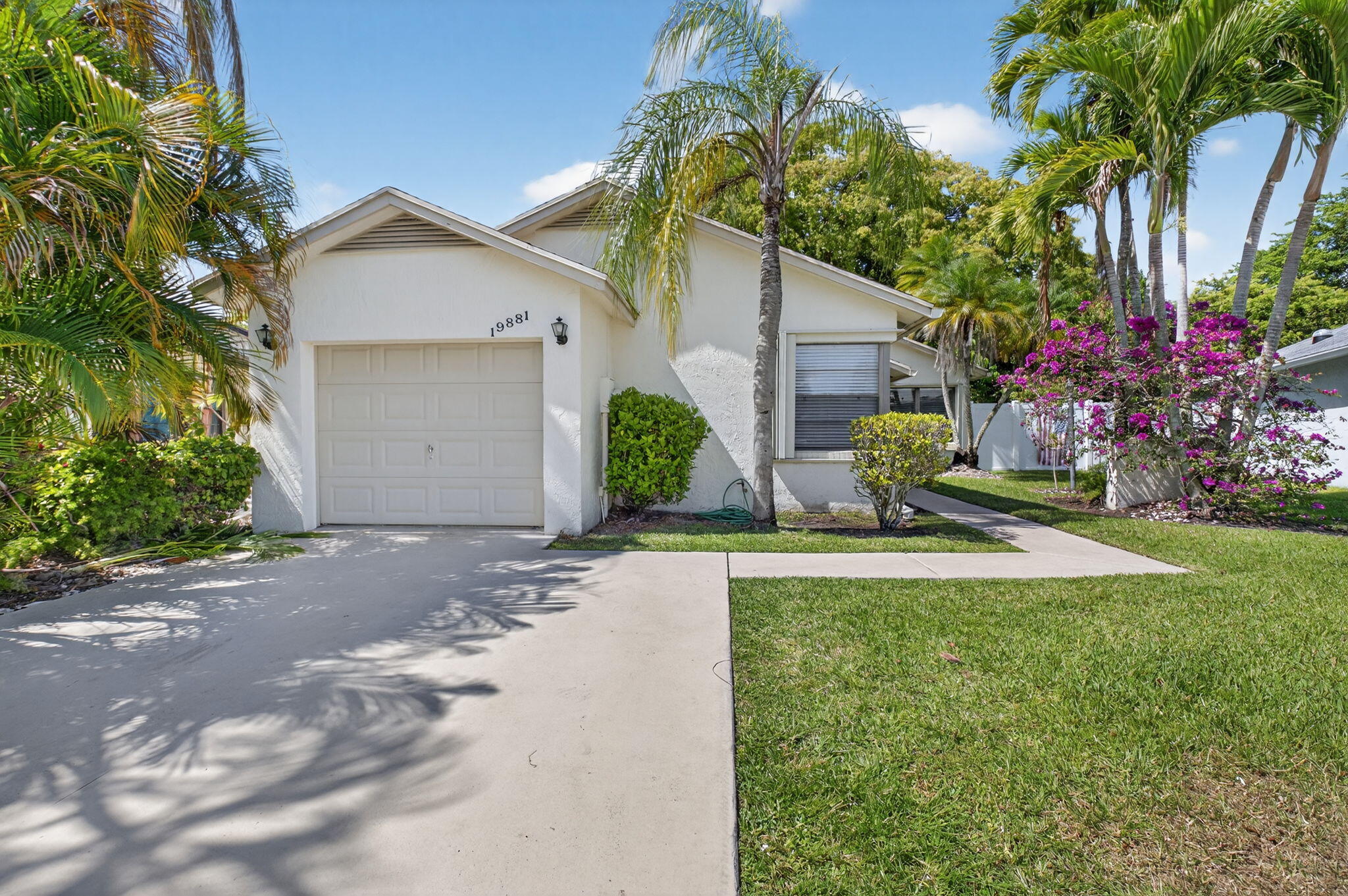 This beautifully renovated 3-bedroom, 2-bath home is tucked away on a peaceful cul-de-sac. The modern kitchen features sleek stainless steel appliances and quartz countertops. A spacious living room and updated bathrooms complement the elegant porcelain tile flooring throughout. The enclosed Florida room offers a versatile space ideal for a home office or additional living area. Designed with a split-bedroom layout on an oversized pie-shaped lot, this home sits directly across from a recreation area offering pools, a hot tub, tennis courts, a clubhouse, scenic walking trails, and more. Enjoy the beautiful relaxing outdoor living space. Prime location offers convenience to shopping, dining, and walking access to houses of worship.