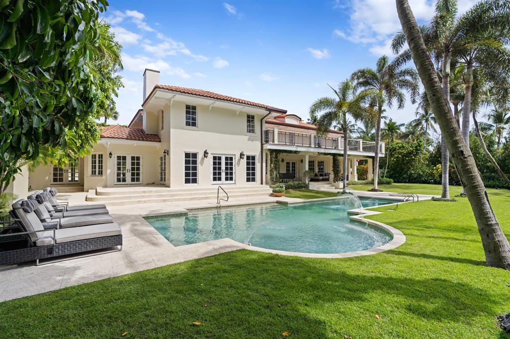 Elegant In-Town Ocean Block Family Home Rare in-town location located on the ocean block of coveted Clarke Avenue. Very near The Breakers, The Royal, Worth Avenue, with the beach at the top of the street! This stunning home features a 28 X 25 sun filled living room, plus formal dining room with bay window and fireplace. Enjoy a gourmet kitchen outfitted with all Thermador equipment and Sub Zero refrigerator. Dual sinks and dishwashers, breakfast area with pool and garden views. Enormous beamed ceiling family room, wood paneled library with wet bar and fireplace. Huge 12 X 50 outdoor covered loggia suitable for al fresco dining. Large Master suite with his and hers baths and closets, and massive 12 X 50 open air balcony. 6 additional Guest bedrooms, 4.1 additional baths. Wonderful gardens with 20 X 40 heated pool, fountains, outside shower, and constant breezes. Elevator, 2 car garage plus 1 open space. With amazing ceiling heights and room proportions this 9,000 +/- total square feet home, with grounds and gardens of 19,000+/- square feet, is a rare in- town find. This property should not be missed!!!