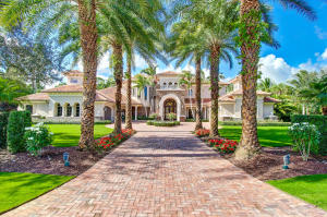 Custom Estate on 1+ Acre with breathtaking views overlooking the 15th fairway & green of the prestigious Old Palm Golf Club. The Vasari model has recently been awarded the Sand Dollar Award for Outstanding Architecture & Product Design. This Estate Home has five bedrooms, all with en-suite baths, two garages with three entry points and room for six vehicles, an open kitchen & family room that flows to an inviting outdoor living area with impact sliding pocket glass doors for seamless visuals and anytime entertainment.  Bedrooms are designed in a split floor plan with sitting areas and fantastic views of the pool and golf course.  Pool table conveys. See supplement - NEWEST TECHNOLOGY Complete walk through of inside home - https://www.12248oldpalm.com This custom estate has many rooms to entertain friends or for families to gather and play or find plenty of spaces for peace and tranquility. Many amenities can be found within this beautiful design such as the theatre room, parlor, outside covered lanais (both upstairs and down), office, bonus room, exercise room, elevator, two laundry rooms (both upstairs and down) and much more.  Enjoy the meticulous design of landscaping which include golf course grass and a luxurious pool area.

Old Palm Golf Club is one of the finest clubs in the country offering limited membership, privacy, security, luxury, superior services and a caddie program with NO tee times. An 18 hole championship golf course designed by Raymond Floyd has a 19th "bye" hole and a private golf studio offering 3 practice holes, hitting bay with V-1 swing analysis, dual ended driving range, private short game, practice, chipping and putting greens. The clubhouse features include: private dining, bar and lounge areas, board room, wine room, concierge services, fitness center with Cybex equipment, free weights, pilates, spin, personal trainers, heated pool and spa, casitas (overnight guest accommodations) Men's & Ladies lounges with spa and salon services, massage and treatment rooms. Old palm also offers its members Beach Club access at The Resort. Membership is available, but not mandatory with the purchase of this home.