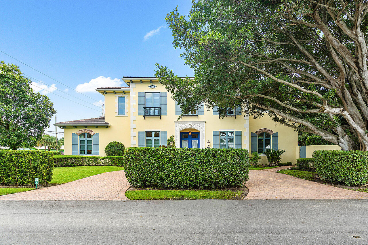 Located just 3 blocks from the beach, this French Modern design by architect Randy Stoftt is situated on a vast 15,246 sf corner lot with 6445 sf of living space and offers 5 bedrooms, 6 baths, an office, billiards room, workout room, and a guest house equipped with a kitchenette, and full bath. As you step in, you're greeted by the grand great room with a wet bar, an expansive dining area, and a chef's kitchen featuring a Le Cornufe gas range, Sub-zero fridge, dual islands, quartz and marble countertops, and custom cabinetry. The large primary bedroom with a seating area, private patio, and a spa-like bath. Outdoors, indulge in the pool or dine al fresco in the summer kitchen. With two covered patios and privacy landscaping, you're set for both grand entertaining and quiet relaxation.