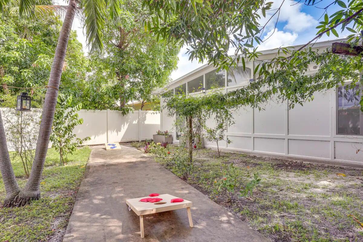 Welcome to this tastefully renovated 3 bedroom, 2 bath single family home ideally located near Gulf Stream Park, Aventura, shopping and dining. Designed for modern living, the open kitchen concept floor plan seamlessly connects the kitchen, dining and living areas. Creating perfect space for entertaining and everyday comfort. The home also features updated bathrooms, contemporary finishes . The Florida room currently used as a game room, offers .endless possibilities as a home office, playroom, gym or additional living space. Step outside to a charming backyard Owner would prefer to rent furnished but there is an option to remove furniture.