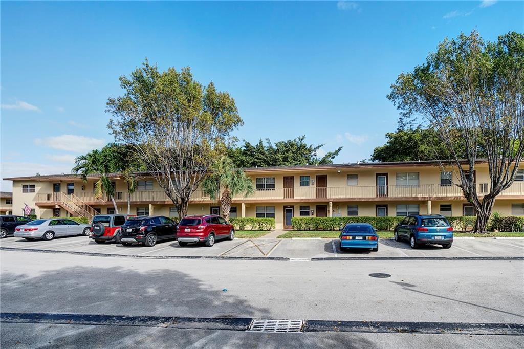 WELCOME HOME TO THIS FABULOUS 55+ COMMUNITY ORIOLE GARDENS, 2ND FLOOR UNIT WITH BEAUTIFUL NEUTRAL TILE FLOORS THROUGHOUT, NICE WHITE KITCHEN OUT TO A EXTRA LARGE COVERED AND SCREENED PATIO OVERLOOKING BEAUTIFUL GARDEN AREA, LAUNDRY RIGHT NEXT DOOR TO UNIT! A MUST SEE