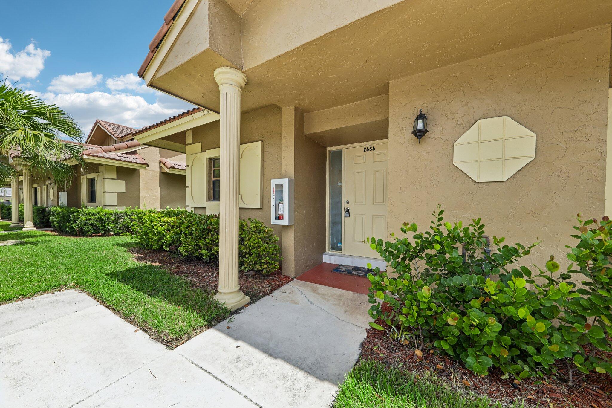 This charming 3-bedroom, 2.5-bath corner-unit townhouse located in the desirable Coral Springs Estate Townhomes III. Offering 1,270 square feet of thoughtfully designed living space across two stories, this waterfront home combines comfort, functionality, & privacy. The well-planned layout features spacious living areas, abundant natural light from the extra windows exclusive to the corner location, and custom blinds throughout. The kitchen is enhanced with custom cabinetry, providing both style and additional storage. A convenient Jack-and-Jill bathroom adds flexibility & functionality for family & guests. Step outside to your own private, comfortable backyard overlooking the water, complete with a mature mango  tree perfect  for relaxing, entertaining, or enjoying peaceful outdoors.