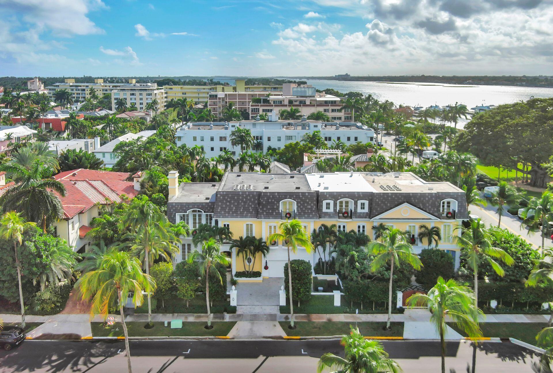 In town living at its best!  Beautiful 3 story townhome steps from the Intracoastal and close to Worth Avenue restaurants and shops. Boasting 6000+/- square feet, this private oasis offers 4 bedrooms with lovely balconies. (one bedroom has been converted to an office/library, but can be easily switched back) 4 full baths and 1 half bath. The living room terrace offers an idyllic oasis for outdoor entertaining overlooking the pool and beautifully landscaped gardens. A true gem in the best