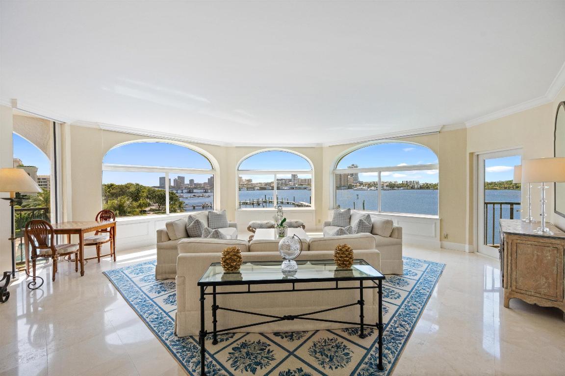 Beautifully situated in the prestigious L'Ermitage, this sophisticated 3BR/4.5BA residence offers sweeping Intracoastal views and elegant, light-filled living spaces. A private elevator opens to grand interiors featuring two spacious balconies, ideal for relaxing or entertaining. The property includes a private poolside cabana, while the community offers two resort-style pools and a Har-Tru tennis court. Ideally located in-town, close to world-class dining, shopping, and the beach, this residence embodies the best of Palm Beach luxury living.
