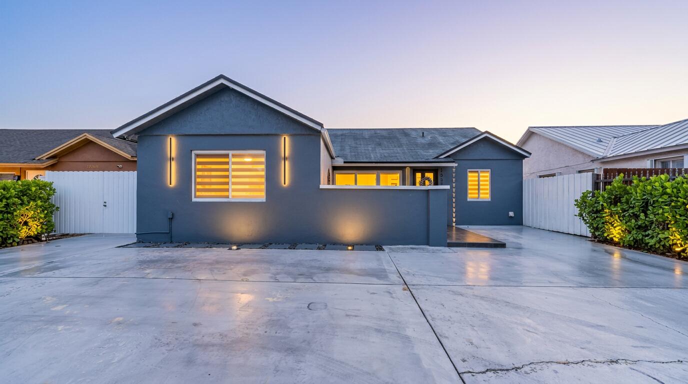 This is your perfect opportunity to own a beautifully remodeled home in the heart of South Florida! This stunning property features new impact windows, doors, along with a brand-new tankless water heater. Inside, you'll find an open-concept layout with new tile flooring throughout, modern bathrooms, and a fully remodeled kitchen designed for both style and functionality. Step outside and enjoy the wonderful pool and covered patio, perfect for entertaining guests or creating lasting memories with the kids. The oversized driveway provides ample parking space for multiple vehicles. This home truly has it all, you have to see it for yourself!