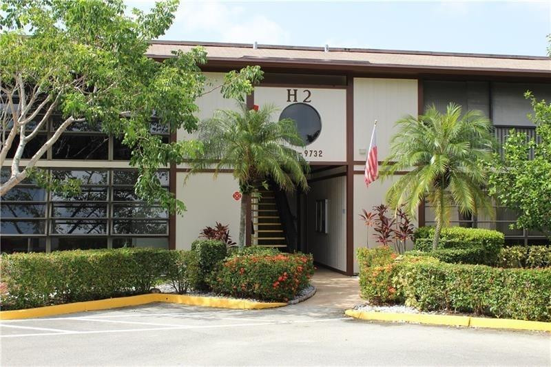 Spacious 2 bedroom / 2 bathroom condo located in Belfort, an over 55 community in Kings Point. Corner unit located on the 2nd floor. Unit features tile throughout the main living area, guest bedroom & patio. Enjoy an open kitchen, large living room and oversized patio with garden view. There is a full size washer and dryer in the unit. Kings Point offers resort style amenities including a large clubhouse, olympic-size pools, heated pool, theatre, fitness center, sauna, tennis & pickleball courts, club activities and more! Property is conveniently located close to the Tamarac Sportsplex, Sawgrass Expressway, supermarkets, restaurants & more!