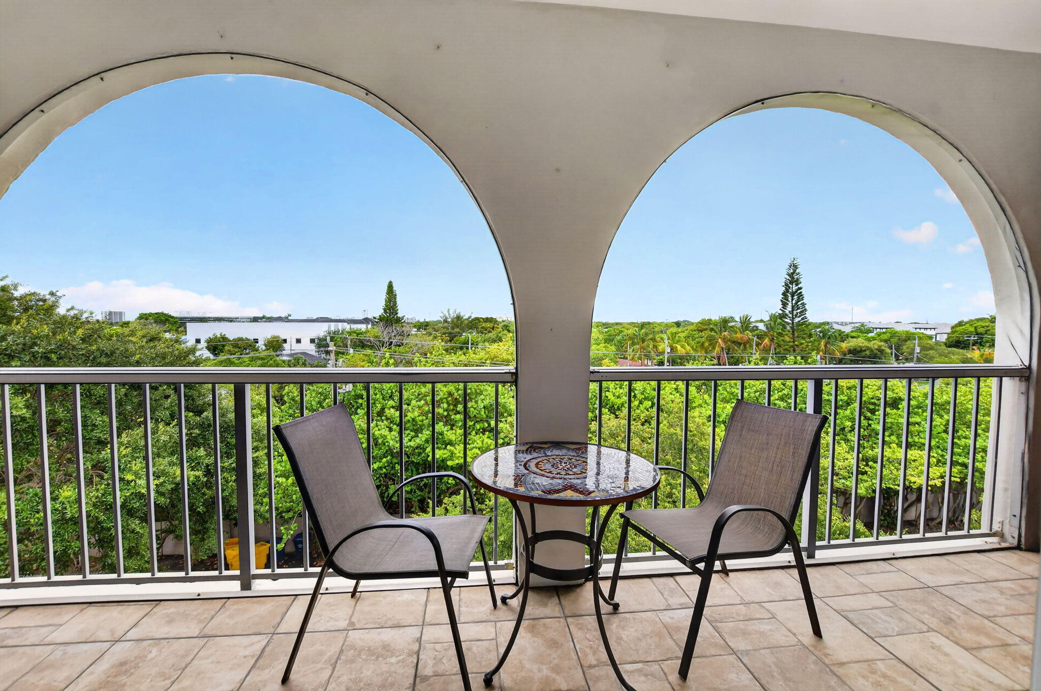 Welcome to this beautiful two-bedroom, two-bathroom condominium located in Tierra del Sol Condo in Boca Raton, Florida. Offering 1,080 square feet of FURNISHED  living space provides comfortable accommodation in an established 55+ community setting. The thoughtful layout with ensures convenience for multiple occupants. Situated in a multi-story building, with ELEVATOR this unit offers bird's eye views of Boca Raton. The kitchen has been updated with white shaker cabiniets, quartz counter tops and ss appliances.  Gorgeous updated flooring connects the spaces.    Furnished and move-in ready!  So convenient to beaches, Mizner Park, Bright Line and Town Center shopping!