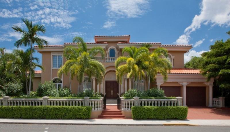 Fabulous In Town South Exposure  5 bedroom 5.5 bath, Mediterranean.  Features Elevator, Marble Floors, High Ceilings, Full House Generator,  Spacious open floor plan,Eat in Kitchen overlooking the pool,  Library, Large Walk -in Closets, great pool with hot tub/spa, two car garage, and storage room/wine closet or exercise room.