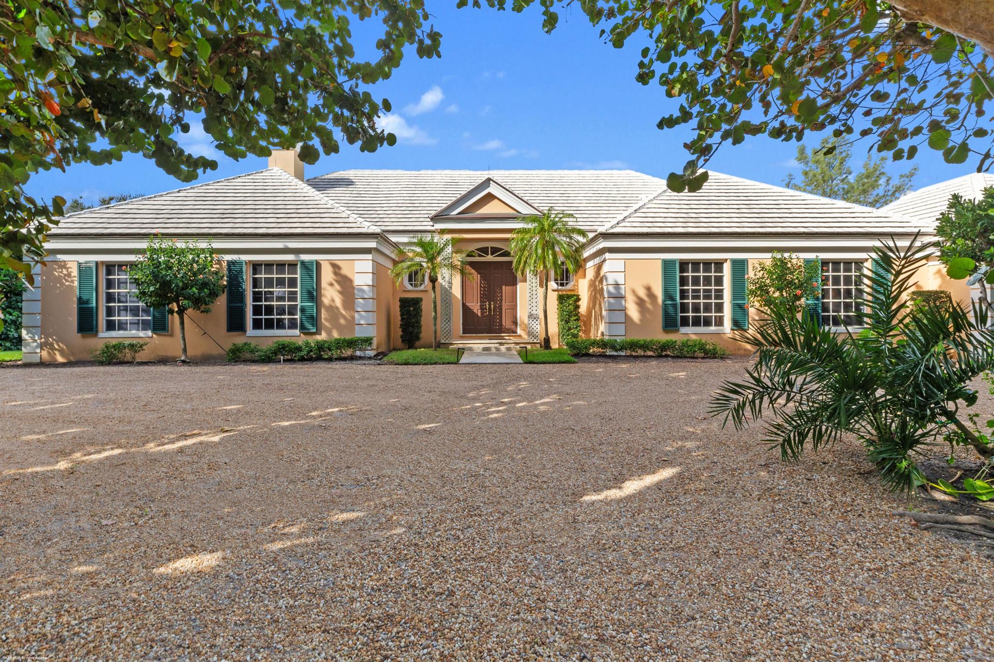 Classic Bermuda Style home on Jupiter Island!  This home features a spacious living room that overlooks an inviting, private outdoor entertaining space complete with a plunge pool. Separate master suite plus a 3 bedroom guest wing is perfect for guests' space and privacy. Only minutes to the beach, shopping and restaurants.