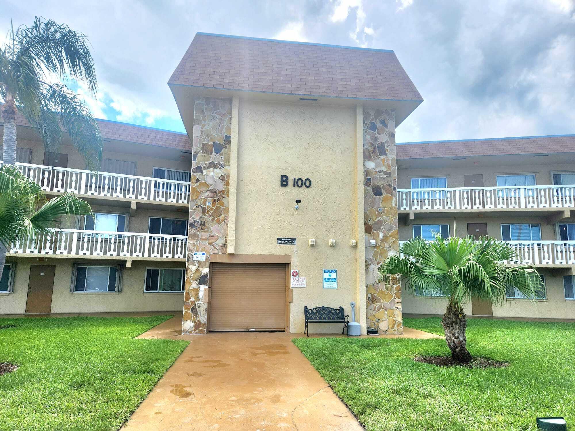 ****Can be rented Immediately after purchase!!!*** Welcome to this charming 2-bedroom, 1.5-bath condo in the desirable 55+ community of Village Green! At least one person on title must be 55 and up; with this condition, occupants over 18 okay! This second-floor unit (Building B) offers approximately 825 sq ft of comfortable living space and is currently vacant, allowing for a quick closing and immediate move-in. The open layout features a bright living area perfect for relaxing or entertaining. The kitchen is functional and ready for your personal touches. Both bedrooms are generously sized, with the primary offering convenient half-bath access. Enjoy easy-care tile and laminate flooring throughout (no carpet!) and accordion shutters on the front windows for added protection and privacy.  Recent updates include a new A/C system (installed January 2023). The unit comes with 1 assigned parking space and 1 guest parking permit.  Village Green is a well-maintained, active adult community offering fantastic amenities including a sparkling community pool, clubhouse, billiards, shuffleboard, and more. Conveniently located in Palm Springs with easy access to shopping, dining, parks, and major roadways.