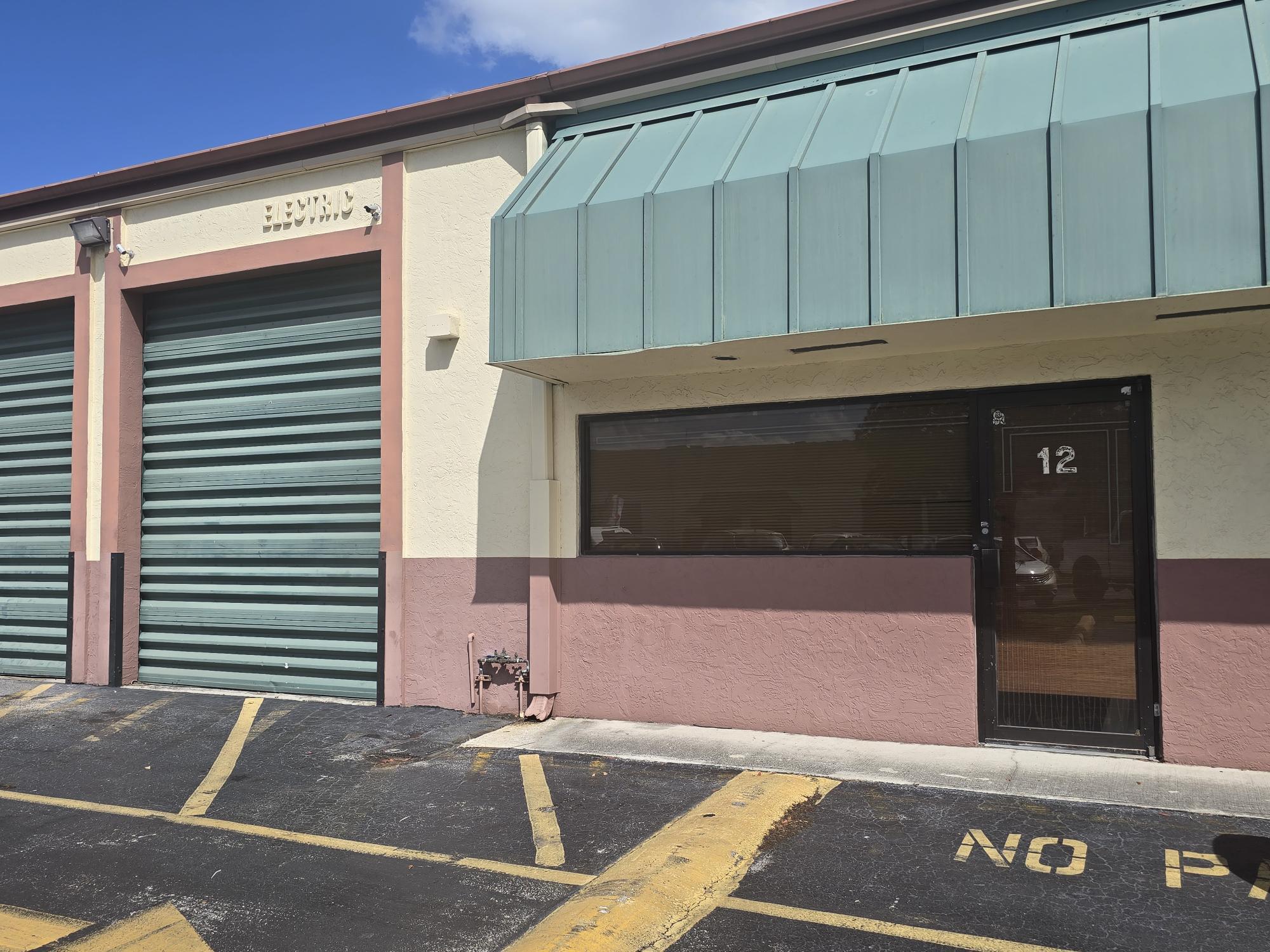 1,030 sq ft warehouse in a prime Margate industrial corridor,   located just off SR-7 (441) and NW 15th Street with quick access to the Florida Turnpike. Zoned M -1 (Light Industrial), this versatile unit features a 12' high bay rollup door, 16' clear ceiling height, a front office with an additional private room, and one bathroom. The property includes three dedicated parking spaces and a monthly CAM of $300. Warehouse dimensions are 34' deep x 30' wide. Owner pays electric and water. This is an excellent opportunity to own a well-located industrial condo in a high-demand North Broward market. Shown by appointment only.