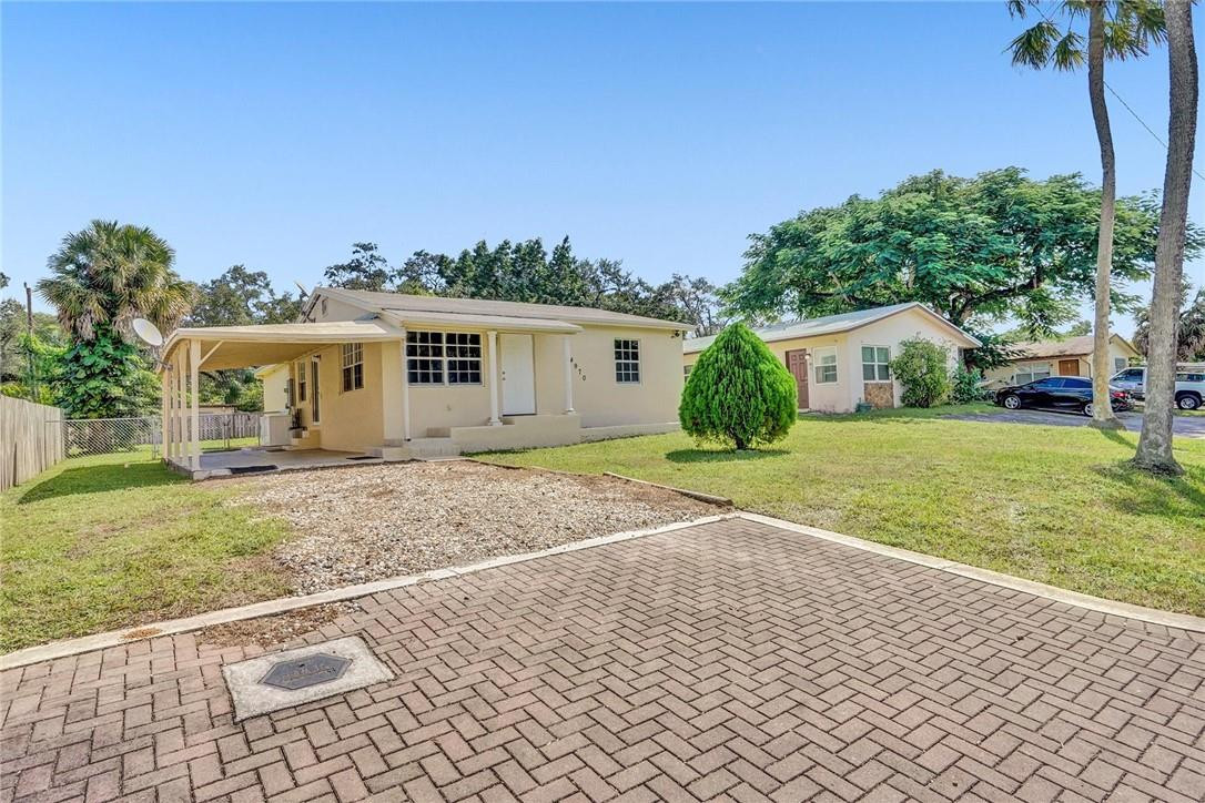 BEAUTIFUL AND CLEAN HOME WITH BRAND NEW ROOF, TILE FLOORS THROUGH OUT AND RECENTLY RENOVATED KITCHEN + BATHROOM! LARGE FULLY FENCED BACKYARD WITH PLENTY OF ROOM FOR A POOL AND TO PARK YOUR BOAT OR RV! SPACIOUS DRIVEWAY WITH ROOM FOR 4 CARS AND A CARPORT TO KEEP YOUR VEHICLE OUT OF THE SUN! NEWER CENTRAL A/C UNIT, UPDATED WINDOWS, RECENTLY PAINTED INSIDE AND OUT AND CONVENIENTLY LOCATED NEAR RESTAURANTS & SHOPS AT DANIA POINT, MINUTES TO THE AIRPORT, HARD ROCK CASINO AND WALKING DISTANCE TO "PATRICK J. MELI PARK" WITH AVAILABLE COMMUNITY POOL! YOU WILL LOVE THIS ESTABLISHED NEIGHBORHOOD! CALL NOW BEFORE IT'S GONE!!!