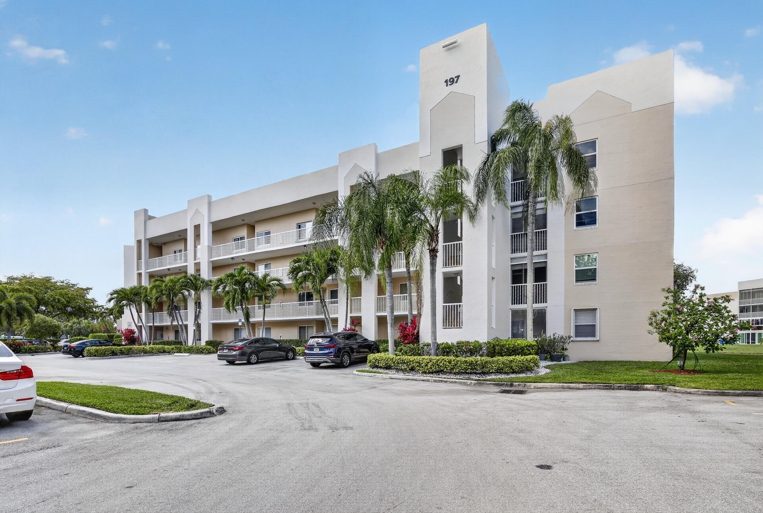Welcome to your piece of paradise. This spacious 1st floor condo features a parking space just steps from your door, a fully renovated interior, including updated kitchen and baths, all new appliances, newer AC and tankless water heater. Enormous in-unit laundry room. Porcelain tile floors throughout and enclosed patio with serene lake views. Just outside, you'll feel like you're in your own lakefront oasis with a lush garden including fruit trees. This active 55+ community features is well maintained with premium amenities including a Million dollar clubhouse with a 1000+ seat theater, pool, tennis, billiards, free community shuttle, social clubs, and more. Located close to grocery, shopping restaurants. Association requires min 700 credit score and $37,500 minimum annual income.