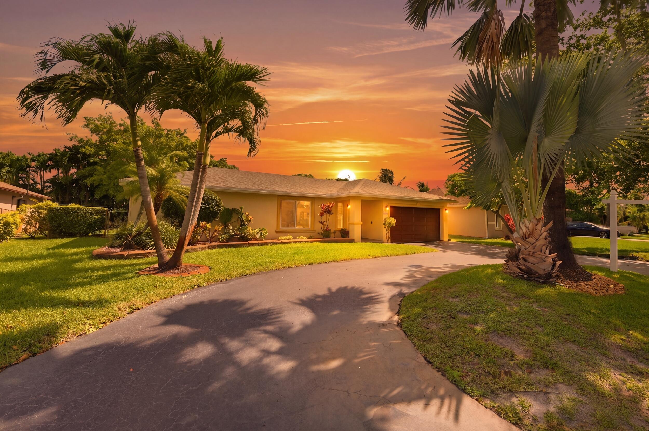 Welcome to life in The Springs, where oversized lots, mature neighborhoods, and no HOA restrictions create the ideal South Florida lifestyle today's buyers are searching for. Featuring all IMPACT WINDOWS & DOORS, this 4-bedroom, 2-bath pool home sits on a spacious lot with a circular driveway and parking for up to 8 vehicles. Inside, the split-bedroom layout offers privacy and functionality with tile and wood floors, formal and casual dining spaces, walk-in closets, and plenty of storage. Step outside to your private fenced tropical oasis - perfect for weekend gatherings, relaxing afternoons, and South Florida living year-round. Zoned for top Coral Springs schools and conveniently located near parks, shopping, dining, and major roads. AC 2023, Water Heater 2017, Roof 2020.