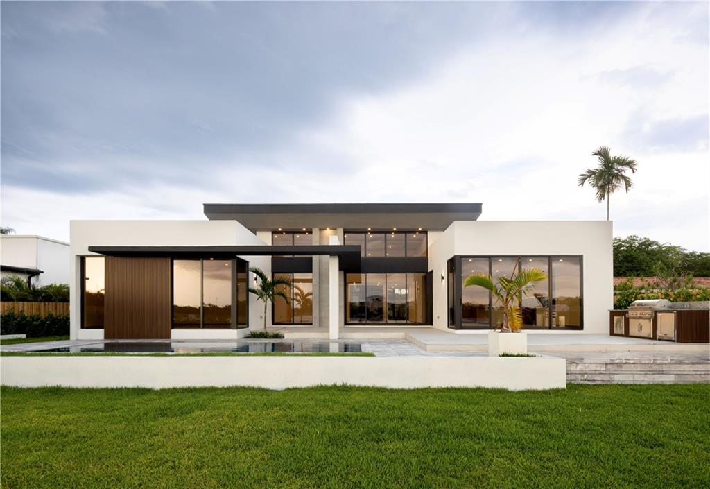 Architectural beauty in the heart of the lake! Brand new modern construction with high end finishes inside and out.Soaring ceilings and plenty of glass throughout the home to enjoy spectacular water views.Oversized living areas that seamlessly lead to a beautiful patio with 2 decks, grass area, swimming pool, summer kitchen and more! The home will feature a large and open Mia Cucina European kitchen with Wolf Subzero appliances. All bedrooms come finished with Italian Pianca closets and have en-suite baths with Mia cabinetry.  Price is Firm. This sensational home will be finished in the spring of 2023.