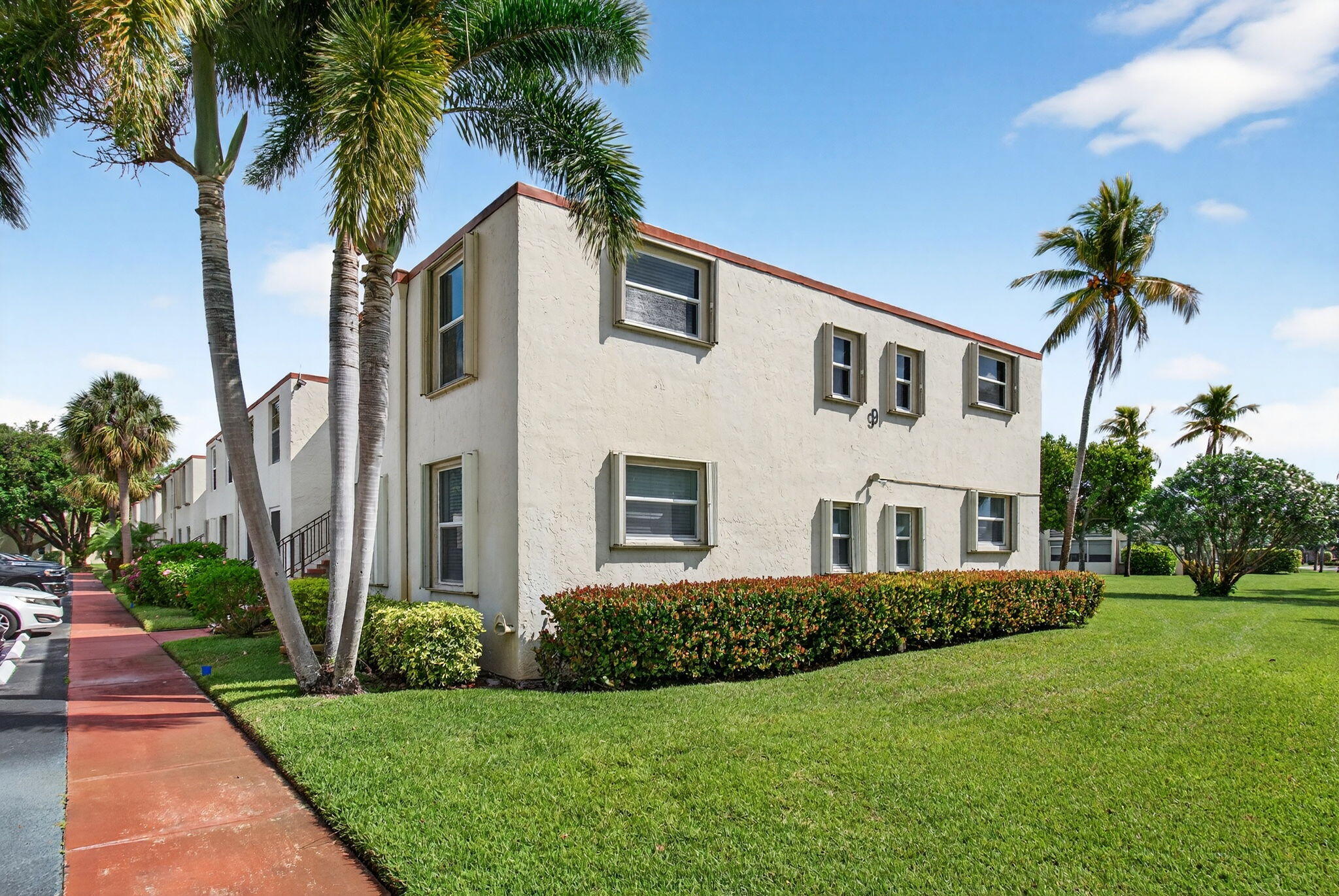 Some homes simply feel different the moment you step inside — and this one delivers. Ideally positioned on a desirable corner in the well-maintained Abbey Village community, this beautifully updated 2-bed, 2-bath residence offers rare privacy, abundant natural light, and a calm, comfortable flow throughout. No neighbors above. Updated flooring, stainless steel appliances, and refreshed kitchen and bath finishes make it truly move-in ready. The enclosed Florida room is the standout — sun-filled, year-round, and perfect for quiet mornings or easy entertaining. Moments from Delray Marketplace and a short drive to the restaurants and rhythm of Atlantic Avenue. For buyers who know exactly what they want — this is it.