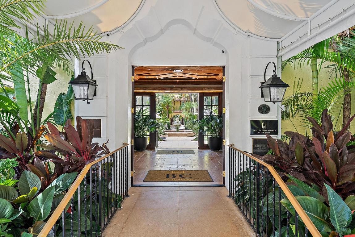 Live in a hotel with all the conveniences!  The Brazilian Court Hotel is a Palm Beach landmark with numerous amenities.  Luxury accommodation includes a 2 BDR, 2 BA hotel-condo unit in one of the best Palm Beach locations.  Enjoy as a lily pad to be close to ''Wall Street South''.  Amenities: beach access with chairs & umbrellas, acclaimed Café Boulud restaurant, lounge, spa, salon, gym, pool, concierge, valet parking, 24-hour front desk staff, maid service, meeting rooms, bikes and yacht privileges on the new 44ft Italian Brunello Acampora. Ideal for a tranquil stay close to famed Worth Avenue shops, fine dining, cultural activities, the Lake Trail and easy airport access. Units can be placed into a hotel rental program.  An easy way to start your Palm Beach residency.