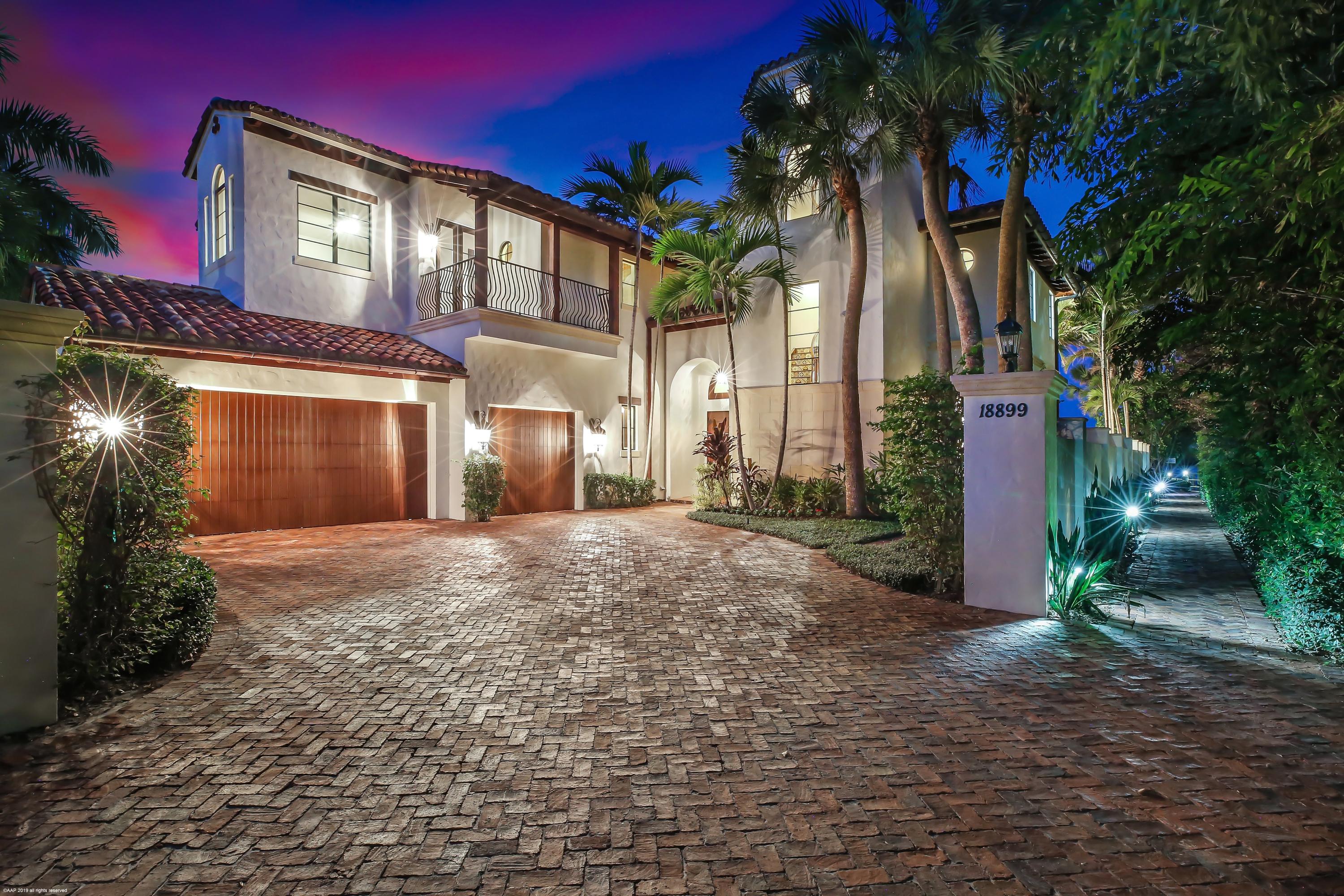 Beautiful Intracoastal Home located in the desirable gated community of Emerald Harbour with unbelievable Bahama Blue water views. Built in 2007, this private estate home offers 6 bedrooms plus office, 6 1/2 baths and a 3-car garage. Enter through a dramatic foyer and behold the stunning water views surrounding the formal living room with 2-story high ceilings and gas fireplace. The chef's kitchen comes equipped with a butler's pantry, prep island, granite countertops, custom cabinetry, top-of-the-line stainless steel appliances (Wolfe, Sub Zero, Bosch & Decor) and overlooks a spacious family room with wet-bar. Additional interior features include a formal dining room with pecky cypress columns, hardwood & Mexican tile floors throughout, elevator, hurricane windows & doors throughout and a second floor master suite with morning bar, his/her walk-in closets, elegant master bathroom & covered balcony with unbelievable blue Intracoastal water views. Exterior features include a covered patio with tongue & groove wood ceilings, summer kitchen, heated pool & spa, 3rd Floor widows walk/deck with wet-bar overlooking the ocean & intracoastal and a deepwater dock with water & electric.